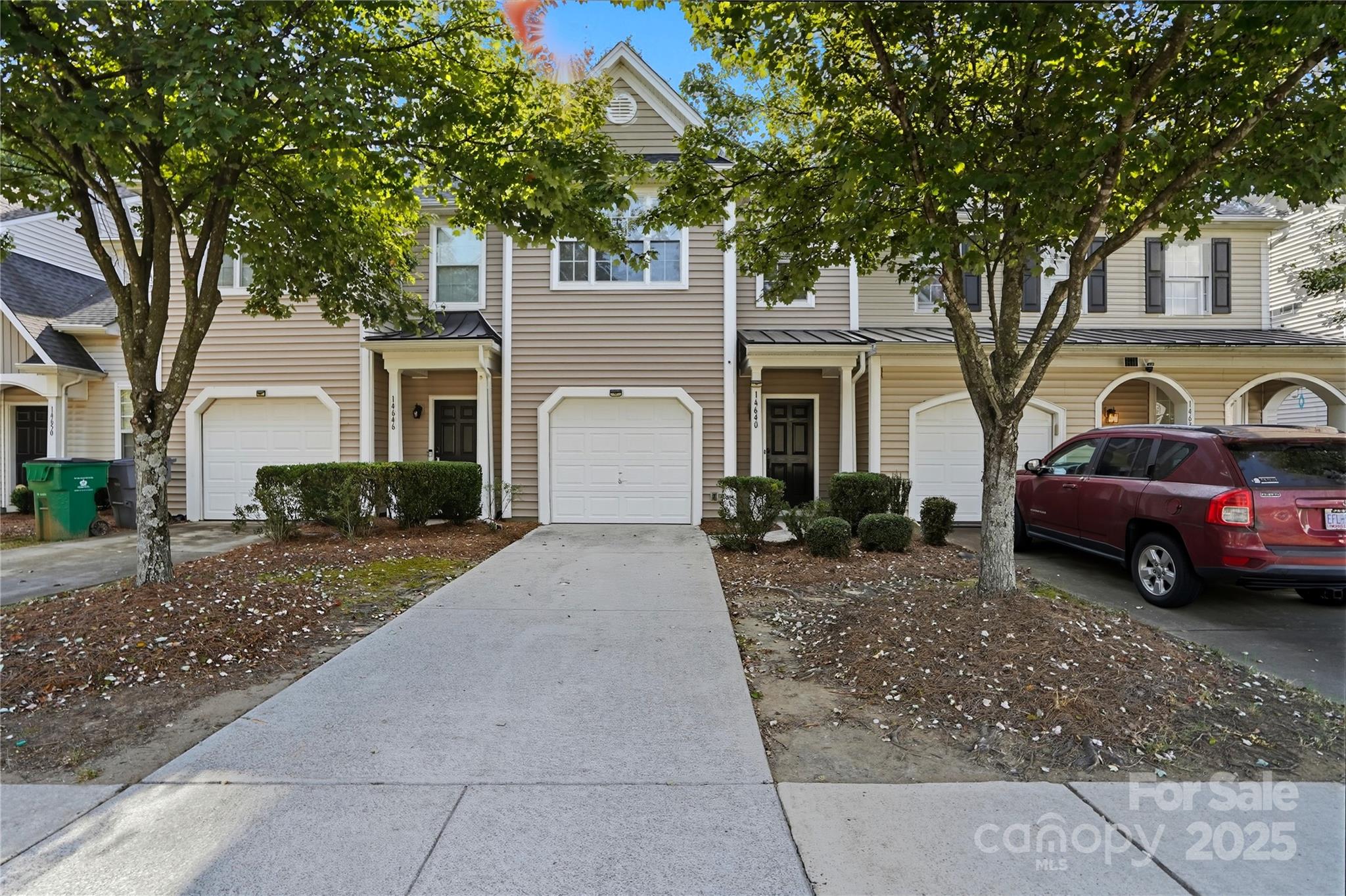 Welcome to this beautifully updated  3-bedroom, 2.5-bathroom townhome with an attached 1-car garage! This property qualifies for 100% financing with no PMI and $20,000 in lender assistance for the following:  Closing costs, rate buy down, and loan amount reduction! Step inside to discover many recent improvements including new durable LVP flooring throughout the main level and bathrooms, all new carpet upstairs, fresh paint throughout, new light fixtures, and new HVAC system.  Main level features  an open-concept floor plan—perfect for entertaining or everyday living. The inviting living area features a cozy fireplace and flows seamlessly into the well-equipped kitchen, complete with ample counter space, abundant cabinetry, and a convenient layout that makes cooking and hosting a breeze. Upstairs you, retreat to the expansive vaulted primary suite, boasting a large walk-in closet, and an en-suite bathroom with dual vanities and a garden tub. Two additional bedrooms offer plenty of versatility for family, guests, or a home office. As a resident of Lions Gate, you’ll enjoy access to the neighborhood pool and well-kept community spaces. Located just minutes from Uptown Charlotte, Charlotte Douglas International Airport, Rivergate Shopping Center, and Lake Wylie, this townhome offers the perfect blend of comfort, convenience, and lifestyle.