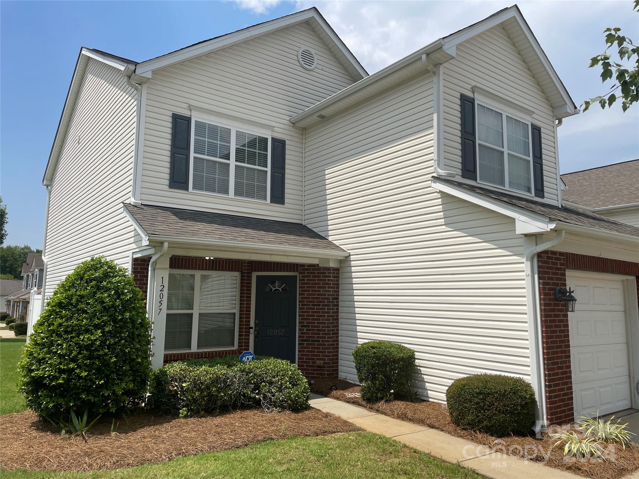 Located in the beautiful and sought-after Carolina Crossing community in Pineville, NC. This end unit townhome features 3 bedrooms, 2.5 bathrooms, with an attached garage. This home boasts an open floorplan with new luxury vinyl plank downstairs and HVAC installed in 2021! Enjoy the private fenced patio or venture out onto the tree lined sidewalks on the way to the community pool. This is a rare find so call today to schedule a private tour. DO NOT DISTURB TENANT!!!