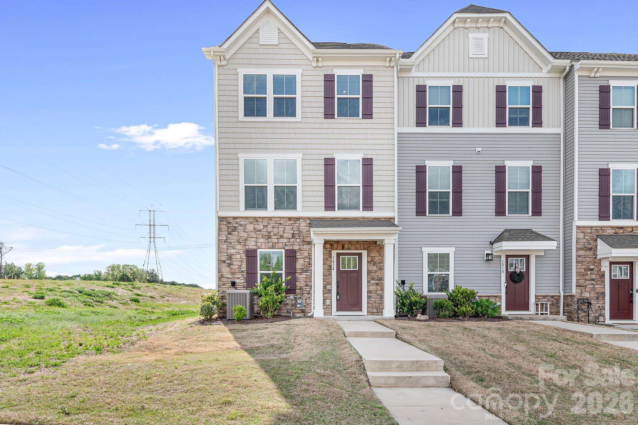 Welcome to 1814 Aspire Street, a stunning end-unit townhome in the highly sought-after Towns at Mallard Mills community. Built in 2023, this three-story residence combines modern luxury with effortless urban living, making it a perfect fit for professionals, students, and families alike. Over 15K in upgrades from builder!  Ceiling fans, Blinds throughout.

First Floor: A 1-car rear-entry garage leads into a functional storage area and a versatile flex space. Enclosed with elegant French glass doors, it is the ideal setup for a home office, gym, or guest lounge. Upgraded wood floors with blinds!

Second Level: The heart of the home boasts a gourmet kitchen equipped with stainless steel appliances, a massive center island, and high-end finishes. Flow seamlessly from the kitchen to the living area and out onto the private deck, perfect for morning coffee.

Top Floor: Your private retreat awaits with a spacious master suite, two secondary bedrooms, a guest bath, and conveniently located laundry facilities.

Situated in the vibrant University City area, you are minutes away from Charlotte’s major hubs:

Proximity: Just 7.3 miles from UNC Charlotte and a short drive to the J.W. Clay Blvd Light Rail Station for easy downtown access.

Shopping & Dining: Enjoy being less than 2 miles from major retail centers and a 10-minute drive to Concord Mills Mall.

Nature & Recreation: Close to the UNCC Botanical Gardens and the Mallard Creek Greenway.

Commuter Friendly: Immediate access to I-485, I-77, and I-85 puts all of Charlotte within reach.