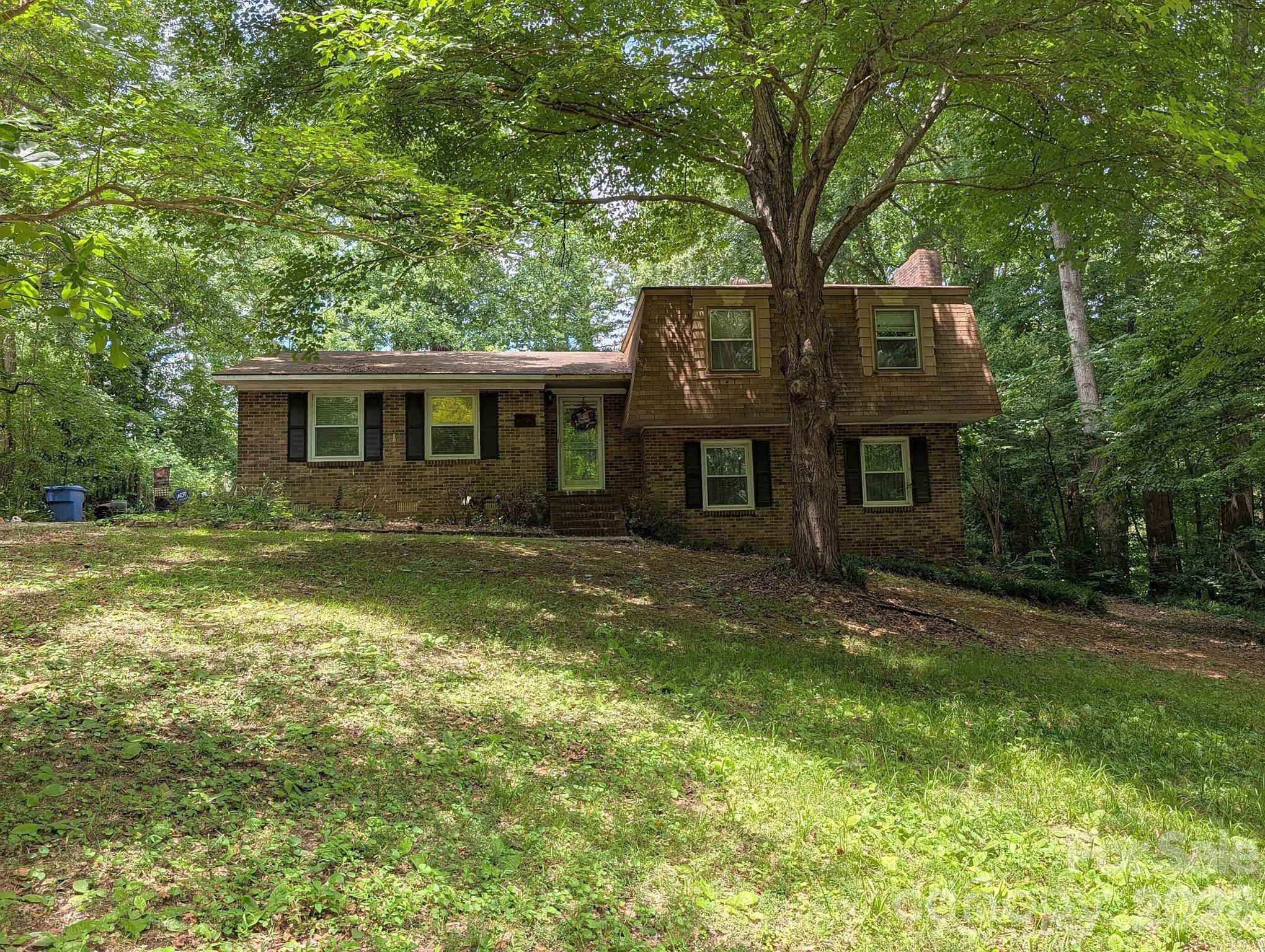 Welcome to Foxwood, where you'll enjoy county-only taxes, no HOA, and one of the largest lots in the community at approximately 0.56acres! This spacious home offers 3 bedrooms and 2 full updated bathrooms with a versatile layout designed for everyday living. The main level features a traditional living room, dining area just off the kitchen, and an additional flex room perfect for a freezer, storage, hobby space, or home office.

On the upper level, you'll find three bedrooms and an unfinished addition designed to create an expanded primary suite with a sitting area, offering a fantastic opportunity for a new owner to complete the space and customize it to their own taste and needs.

The lower level features a cozy den with a brick fireplace, a large laundry closet, and an updated full bathroom complete with a relaxing, jetted tub. Also located on the lower level is unfinished in-law suite space, providing endless possibilities for multigenerational living, guest quarters, a home office, hobby area, or additional living space.

With updated bathrooms, multiple living areas, county-only taxes, no HOA, and plenty of room to add value through your own vision, this Foxwood property is packed with potential and ready for its next chapter.