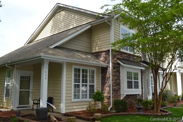 Beautiful end unit townhome with spacious open floor plan!  Vaulted ceiling, fireplace and plantation shutters in great room.  Master Bedroom and laundry conveniently on first floor!  Neighborhood has sidewalks and a pool!