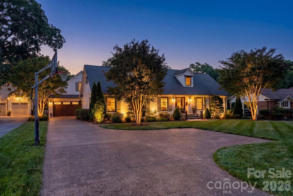 **Back on the market through no fault of Seller/Home** Welcome to 3335 Providence Road, a rare and exceptional property designed for everyday comfort and unforgettable gatherings.
This stunning home is centered around a resort-style outdoor living space that feels like your own private retreat. The fully fenced backyard provides excellent privacy with mature, established landscaping. Enjoy the saltwater pool surrounded by an expansive travertine pool deck - perfect for hosting or relaxing in total privacy. A covered veranda offers a full outdoor kitchen and living area, anchored by a cozy wood-burning fireplace - ideal for year-round enjoyment.
Inside, the home continues to impress with a chef’s kitchen featuring custom cabinetry, a large granite island, gas range, and dedicated coffee bar. The main-level primary suite offers convenience and luxury, featuring its own private laundry room and a spacious walk-in closet. Throughout the home, you’ll find hardwood flooring and custom tile work that reflect quality craftsmanship and thoughtful design.
For auto enthusiasts, the extremely rare 5+ car garage offers incredible flexibility and functionality. A secondary garage door opens directly to the pool patio and backyard, seamlessly blending indoor and outdoor living. Above this space, is a private mother-in-law suite complete with a kitchenette and full bath.
This is a rare opportunity to own a home that perfectly balances luxury, comfort, and exceptional indoor-outdoor living. The highly desirable Providence Park location is just minutes from Cotswold and Strawberry Hill shopping and dining.