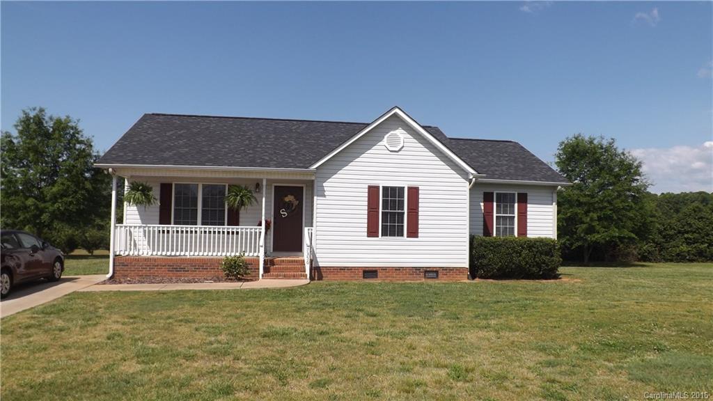 Completely updated home on a large 1.5 acre lot. Three spacious bedrooms with large closets. Two totally updated full baths and an updated kitchen, all have granite counter tops.  Stainless steel appliances and a mounted flat screen television will convey with the home. Beautiful hardwood floors and an open floor plan make the home very inviting. New roof and 10x20 storage building installed this spring. Everything has been done within the past three years. Nothing needed here to move right in.