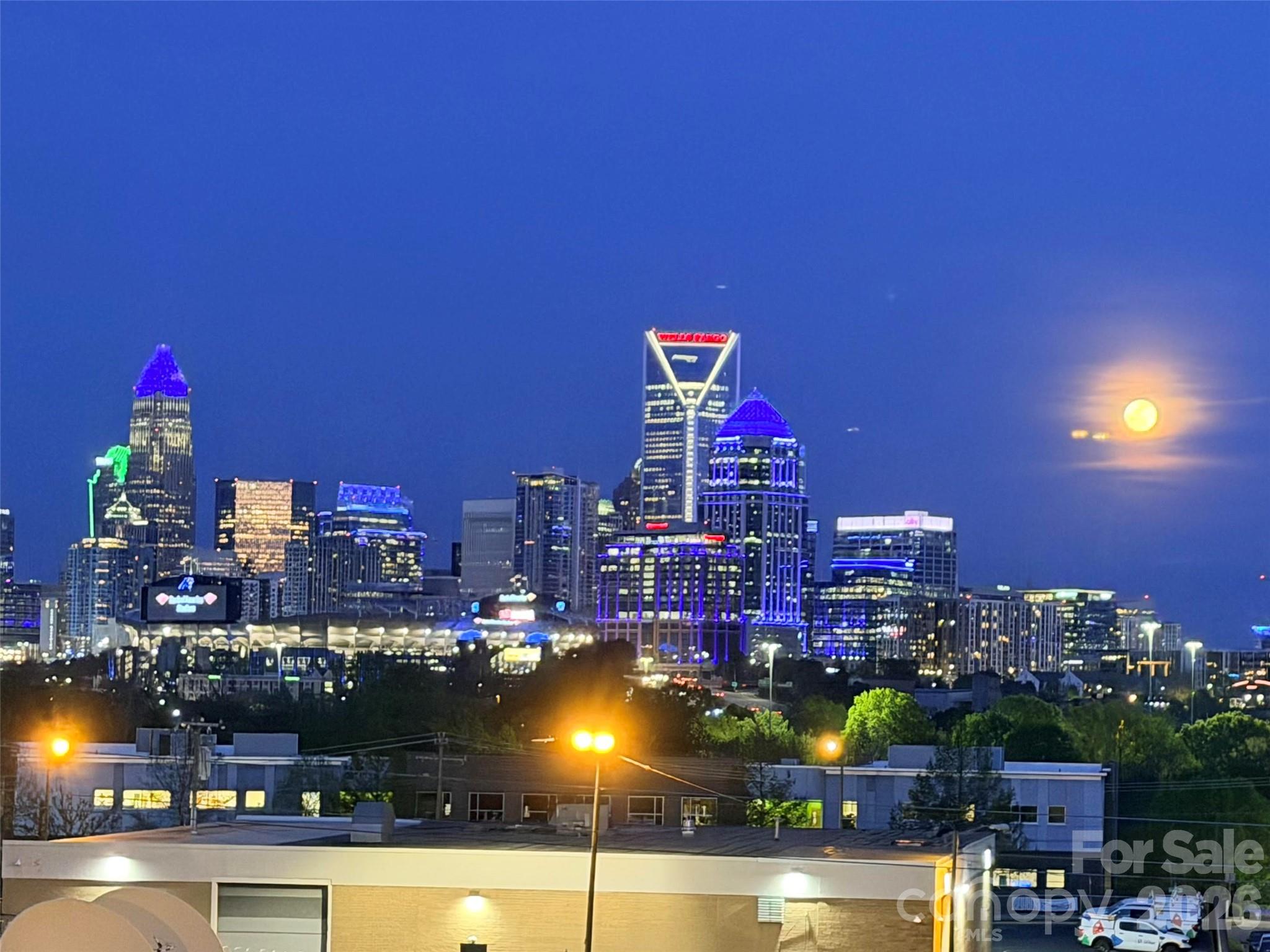 AMAZING UPTOWN VIEWS from your rooftop balcony! This is a former builder's Model Home with all the upgrades that come with it. Featuring upscale finishes such as 7-inch plank hardwood floors throughout, dark gray upgraded cabinets, quartz countertops, stainless steel appliances, soft close cabinets, distinctive lighting & more! Live in the heart of Charlotte’s dynamic FreeMoreWest neighborhood adjacent to the Legion Brewery, within walking distance of dozens of restaurants and shops along West Morehead and just 1 mile from Uptown, close to greenways and parks, dog park in the community.