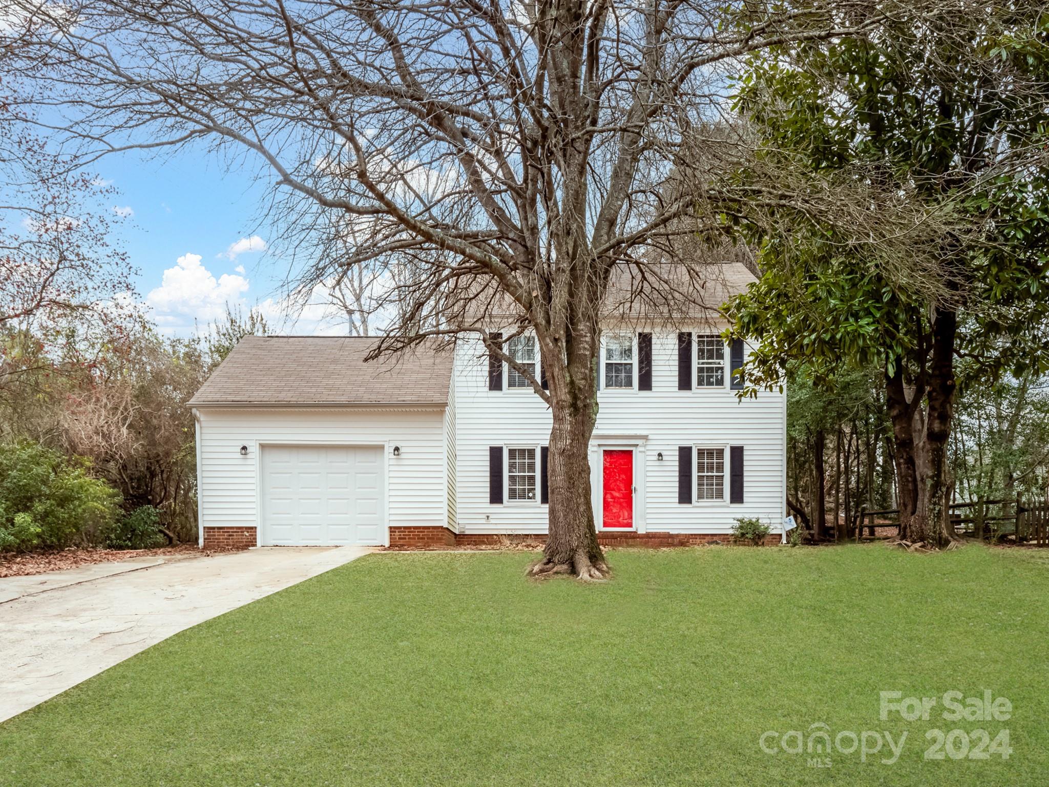 Great opportunity in the highly desirable Raeburn neighborhood! Walking distance to Blakeney shopping and dining, convenient to Stonecrest, Ballantyne, easy access to 485, and highly ranked schools! Neighborhood amenities include community outdoor Olympic sized pool, tennis courts, basketball and volleyball courts, sports field, walking trails and more! This adorable home is nestled on the end of a very quiet street with lots of privacy. Interior features include updated kitchen, open floor plan, large family room with fireplace and hardwood floors throughout the main level. Upstairs features 3 bedrooms, including spacious master suite and second full bathroom!  Brand NEW carpet installed June 2024.. Home has attached one car garage with walking door access to the rear of the home. Buyers do not want to miss this one!