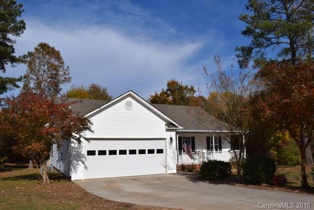 Cute as can be and it will not last long!  Large lot, fenced back yard.  Property line goes well behind the fence where there is a firepit!  Great room has a fireplace/gas logs, spacious kitchen with stainless appliances.  Three bedrooms and two full baths.  Double garage, rocking chair front porch. New roof in 2012.  Great location in the cul-de-sac!