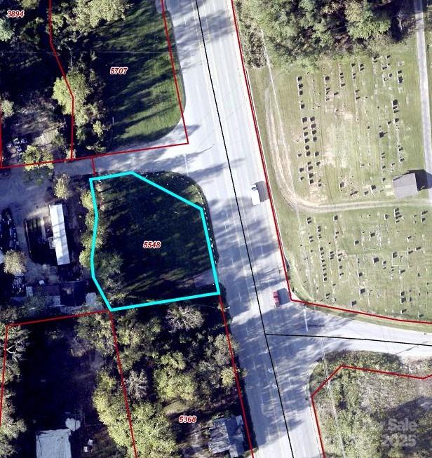 New Pricing:  Fairly Level 0.39/ac commercial lot in South Asheville.  MSD Sewer Line in back of property.  Many possible uses, small office, retail, coffee, etc...