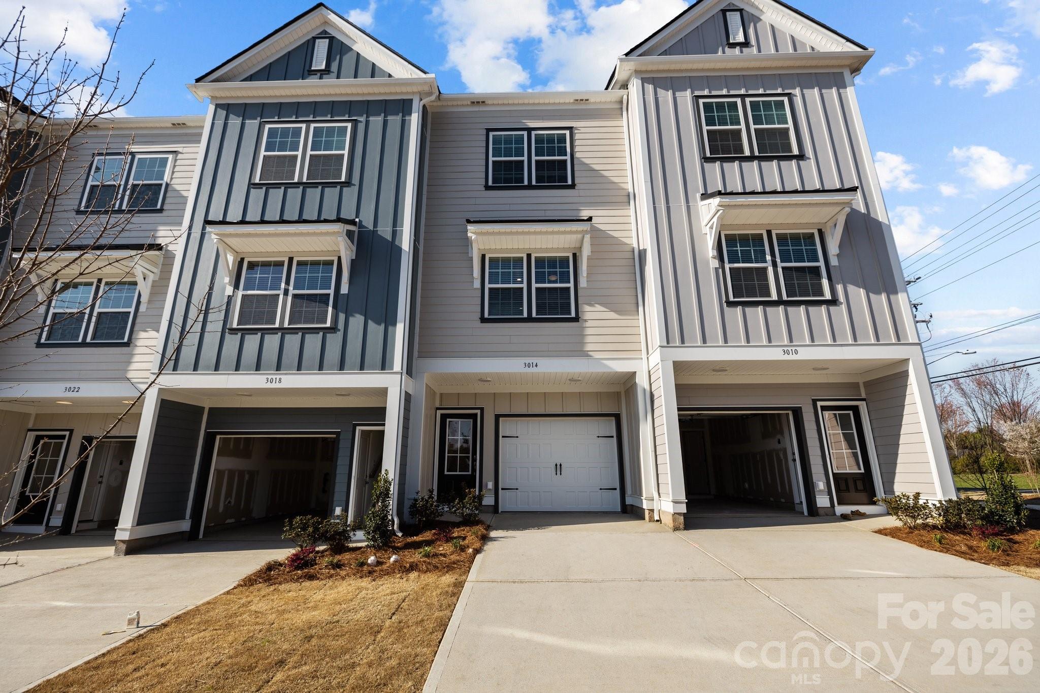 New Adjusted Price and New Construction only 2 miles from historic downtown Matthews! Move in Ready! Construction in neighborhood now complete! No dealing with construction traffic. Only 62 homes total in this quaint neighborhood. Efficient, well-appointed townhome w single car garage. Designer-inspired 42" kitchen cabinets, granite countertops, stainless steel appliance package, recessed LED lighting, LVP flooring and more.  Amenities include walking trails, 2 bark parks, tot lot, green spaces and hammock stations.  This is the only new construction at this price point in this zip code!! 5k flex dollars with pref lender and attorney.  All Landscaping, water and sewer included in HOA dues.