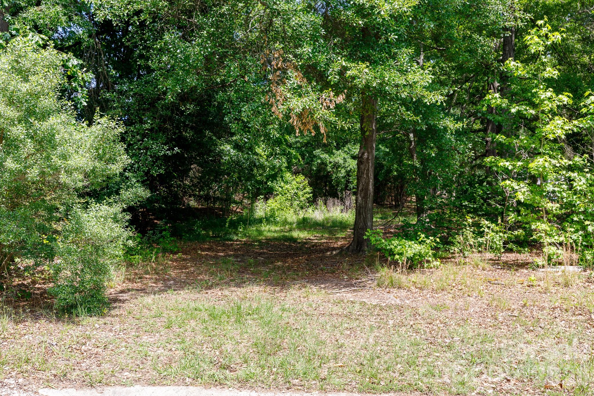 An exceptional opportunity to build your dream home in Harlinsdale, one of Rock Hill’s most prestigious and sought-after communities. As the only available lot in this established neighborhood, this 0.81-acre property is perfectly positioned at the end of a quiet cul-de-sac, offering a rare combination of privacy and community. The spacious lot provides the ideal canvas to design a custom estate tailored precisely to your lifestyle. You will love the convenience of this prime location, which offers quick, easy access to the interstate and sits just minutes away from top-tier local shopping, dining, and recreation. Bring your vision to life and secure your spot in an exclusive neighborhood where custom luxury is the standard.