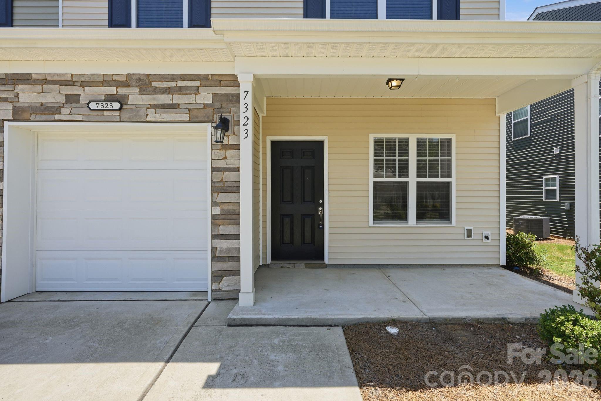 Don't let "2-bedroom" fool you — this End Unit McDowell Crossing townhome lives like a 3-bedroom, thanks to a versatile flex room and loft that most comparable 2BR homes simply don't offer. This beautifully refreshed, move-in-ready home gives you the flexibility to create a home office, guest suite, playroom, or media room—without sacrificing the open, low-maintenance layout you want.

The main floor plan offers 2 spacious bedrooms and 2.5 baths, with fresh interior paint and a newer refrigerator, washer, and dryer so you can move in with confidence. The kitchen shines with a sought-after gas range making meal prep both easy and enjoyable. Upstairs, the additional loft and flex room give you the extra square footage and functionality buyers typically pay a premium for in a 3-bedroom layout—without the added cost.

Set on one of the community's most desirable corner homesites, this home enjoys extra natural light, added privacy with just one adjoining neighbor, and a more spacious feel. Step outside to a fully fenced backyard with an extended concrete patio—ideal for grilling, relaxing, entertaining, or giving pets a secure space to roam. A two-car driveway offers convenient parking, and the community pool is just steps away.

The HOA covers exterior maintenance and water service, so you can spend less time on upkeep and more time enjoying Charlotte. Whether you're a first-time buyer, busy professional, frequent traveler, downsizer, or investor, this home delivers the lock-and-leave convenience—plus the flexible space—that's increasingly hard to find.

Location is a standout: the 41X Express Bus to Uptown Charlotte stops right at the community entrance, and the LYNX Blue Line, I-77, I-485, and Charlotte Douglas International Airport are all just minutes away. Costco, Publix, Walmart, Lowe's, and countless restaurants make daily errands effortless, while Ayrsley Town Center, Carowinds, Topgolf, McDowell Nature Preserve, and Atrium Health Steele Creek keep shopping, dining, recreation, and healthcare close to home.

This house offers the space, flexibility, and value of a 3-bedroom home—in a low-maintenance, 2-bedroom package—in one of Charlotte's fastest-growing areas.