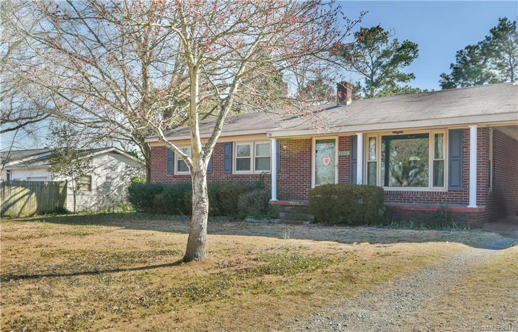 Great location convenient to the interstate yet still features a private yard and quiet setting.  3 bedrooms and 1.5 baths with hardwoods in the bedrooms and living room.  This brick ranch features a large eat-in kitchen with tile floors and an entrance directly from the carport.  The home also features a fenced-in backyard with a detached storage building.  No HOA and County Taxes are even more great features!