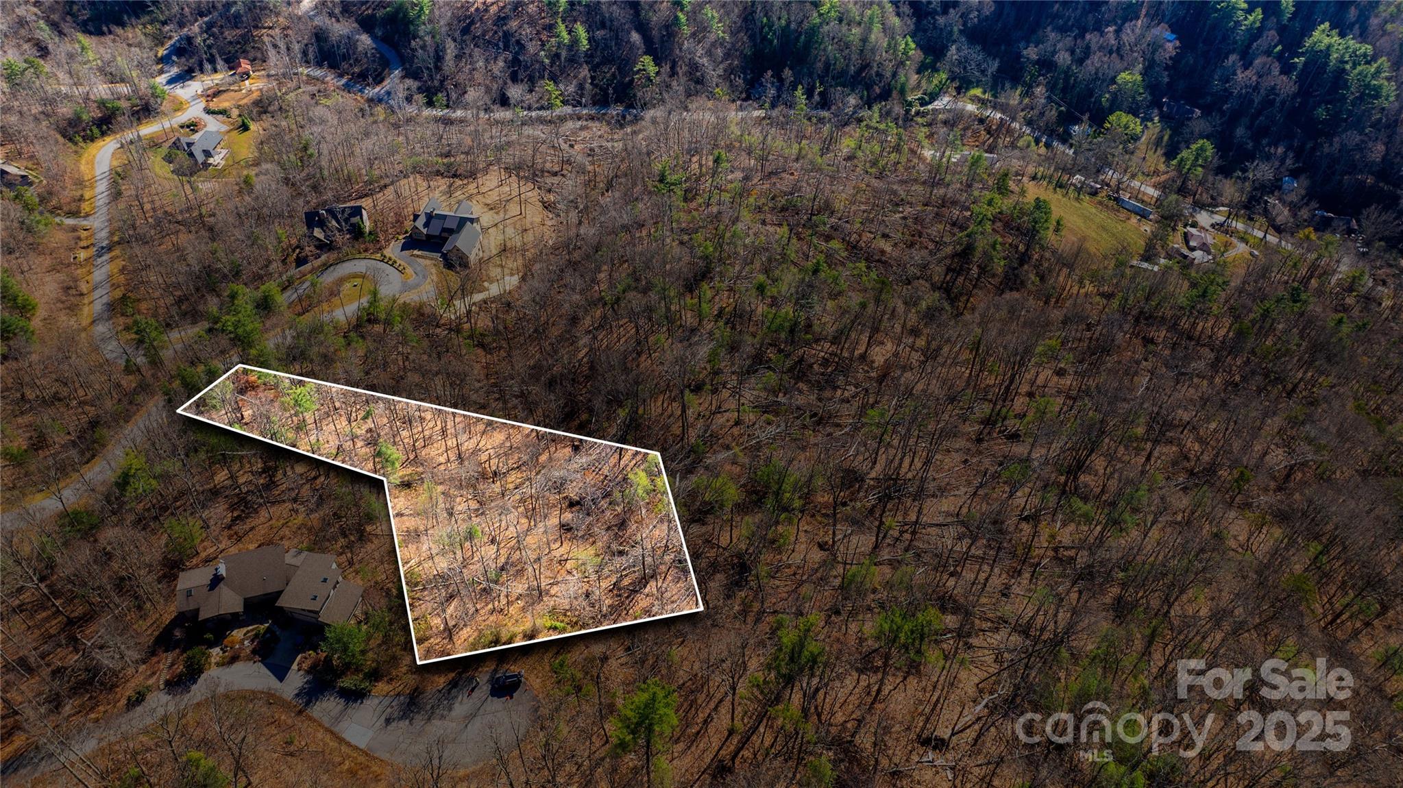 HUGE 1.58 ACRE LOT IN GATED community of Versant, North Asheville.  RARE FIND!!  COME BUILD YOUR DREAM HOME IN YOUR OWN SLICE OF HEAVEN!   HUGE LOT!  PLENTY OF ELBOW ROOM!!  CLOSE TO ALL THINGS ASHEVILLE!  WECOME HOME!  PRICED TO SELL!!