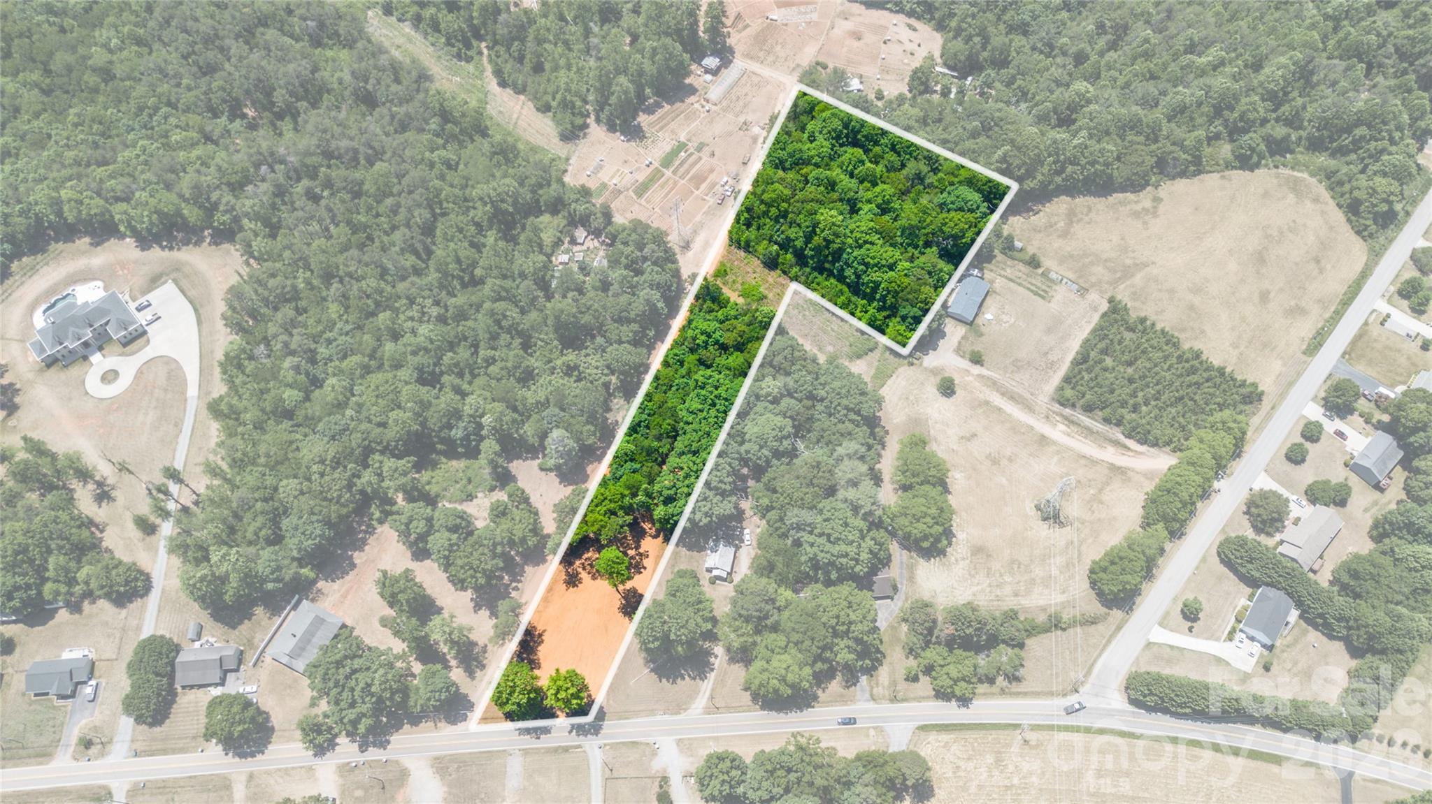 Beautiful flat 3.2 Acre property located minutes away from downtown Hickory between the town of Longview and Burke county with city water and sewer available. Cleared and ready for your new home. Having both city water and sewer available make the cost of new construction much more predictable, while the land in the back allow for endless possibilities.