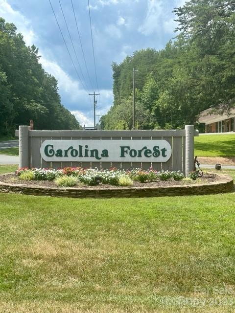 Lake Tillery building lot in the gated community of Carolina Forest.  Lake access with community amenities are what makes this gated community so desirable. Private neighborhood with lake access, pool, clubhouse, tennis court and playground.  Since this is a gated community, a real estate agent must accompany all interested parties in order to gain access to the community. Carolina Water services the community.