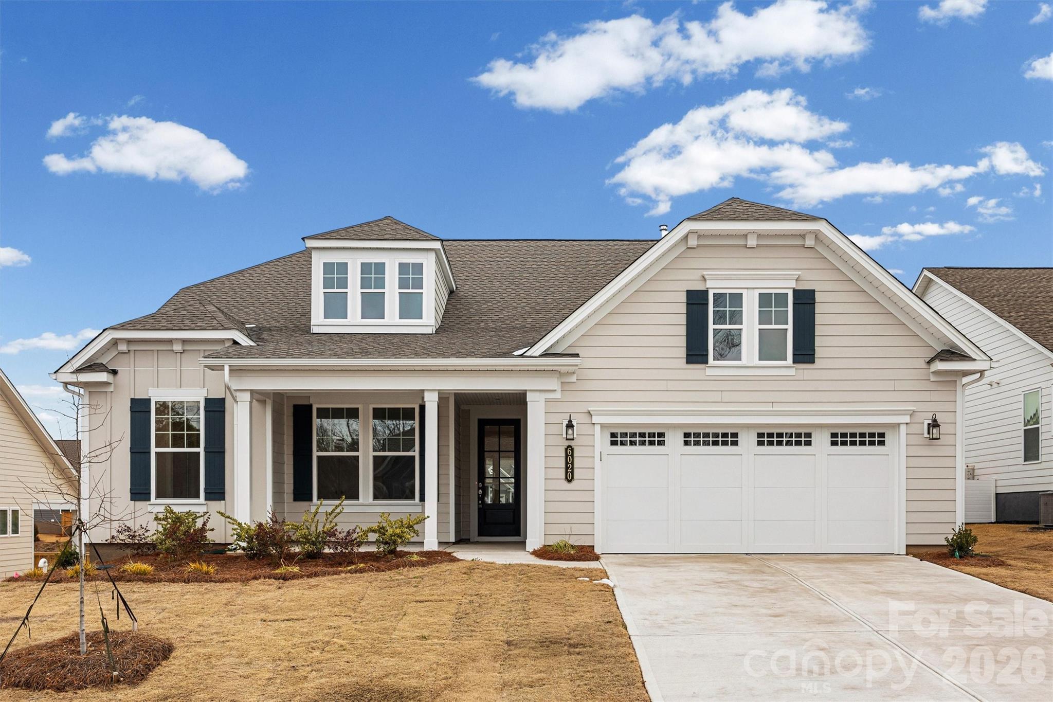 Move-In Ready New Construction! The highly sought-after Maple II Plan shines with 2 bedrooms, 2.5 baths and a flex room, soaring ceilings, and dramatic tall windows that flood the home with natural light. Thoughtful upgrades include a 4’ extended garage, a stunning linear stone fireplace with full-height stone surround, and an expansive 8x32 uncovered deck—perfect for entertaining or unwinding outdoors. Bath 2 features a sleek walk-in shower in lieu of a tub, adding a modern touch. Tucked away on a quiet cul-de-sac, this home offers a spacious lanai and rear deck for effortless indoor-outdoor living.
 Residents of The Gentry at Handsmill enjoy a vibrant active adult lifestyle along with exceptional resort-style amenities, including a beautiful clubhouse, pool, fitness center, private RV and boat storage, wet slips, and a boat ramp. The marina and dry storage leases available first come first serve. This move-in-ready home blends luxury, convenience, and lifestyle—everything you need to begin your next best chapter.