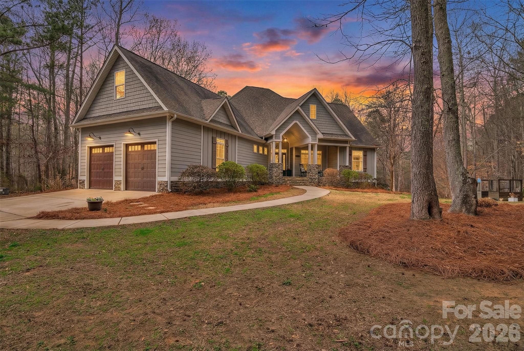 BACK ON THE MARKET AT NO FAULT OF THE SELLER AFTER THE PREVIOUS BUYER’S FINANCING UNEXPECTEDLY FELL THROUGH PRIOR TO CLOSING.

Nestled on 6.68 private, wooded acres in the desirable Olde York Farms community, this custom-built estate offers the perfect blend of refined living and peaceful countryside charm.

Built in 2017, this thoughtfully designed home features over 4,200 square feet of living space, including a fully finished walk-out basement ideal for multi-generational living or guest accommodations. The main level showcases an open and inviting layout with a spacious living room centered around a gas fireplace, a well-appointed kitchen with a large island, gas range, and breakfast bar, and a dining area perfect for gathering.

The primary suite is located on the main level and offers a true retreat with a spa-like bathroom featuring a soaking tub, separate shower, dual vanities, and generous closet space. Two additional bedrooms, a dedicated office, and a convenient drop zone complete the main floor.

Upstairs, a versatile bonus room provides the perfect flex space for a media room, playroom, or home gym.

The finished basement expands the home’s functionality with an additional bedroom, full bathroom, second living area, flex space, and kitchenette—ideal for extended stays or entertaining.

Outdoor living is just as impressive, with a covered front porch, screened back porch, expansive deck, and patio overlooking the private, wooded surroundings. Enjoy evenings around the fire pit or relax by the in-ground pool, creating your own secluded retreat.

Additional features include a two-car side-load garage, tankless water heater, well and septic, and no HOA restrictions—offering both comfort and freedom.

This is a rare opportunity to own a private estate with modern amenities, just a short drive from the conveniences of York and surrounding areas.