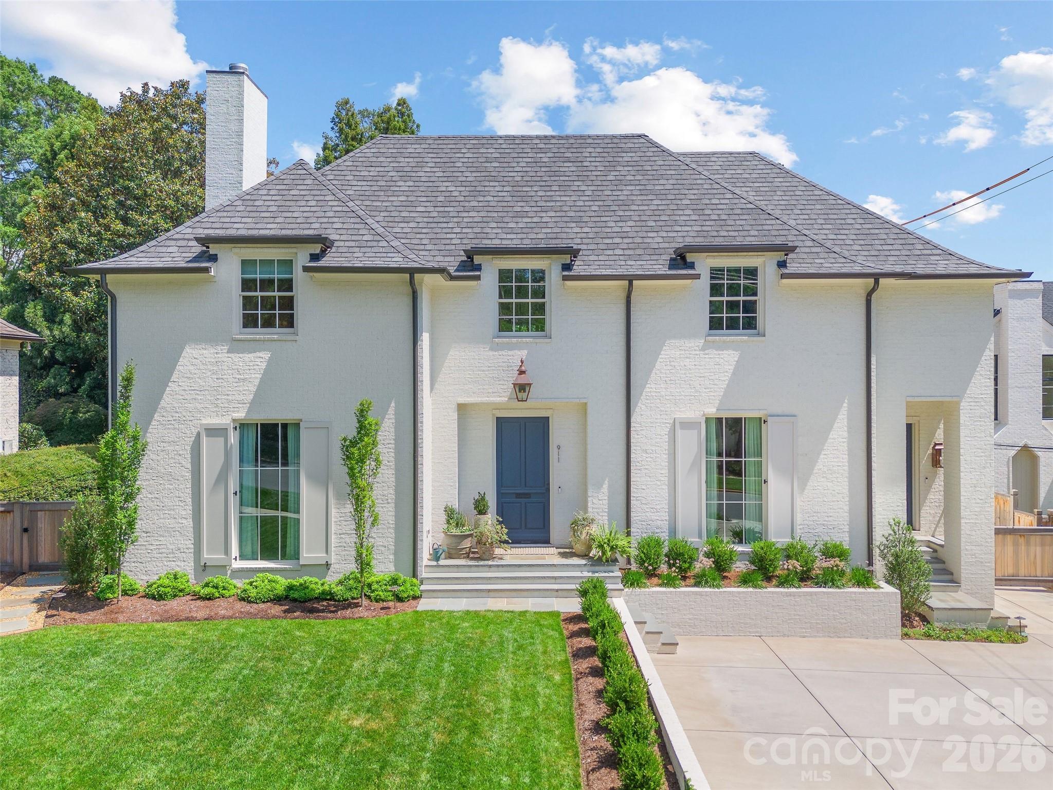 LUXURY LIVING IN EASTOVER!  This spectacular residence by Whittington Builders and Greg Perry Design exudes timeless elegance.  Thoughtfully designed for effortless entertaining and comfortable everyday living, the home showcases exceptional craftsmanship and high-end finishes throughout.  The main level features a spacious living room with fireplace and an elegant dining room ideal for gatherings.  A show-stopping chef’s kitchen opens seamlessly to a fireside family room and a bright, sun-filled breakfast area, creating the perfect heart of the home.  A convenient side entry with drop zone and built-ins adds everyday functionality.  Upstairs, the primary suite offers a serene retreat with a beautifully appointed ensuite bath featuring dual vanities, soaking tub, walk-in shower, and two generous walk-in closets that expands to one.  Three additional bedrooms, recreational room and a laundry room complete the upper level.  Above the detached two-car garage, a private guest suite or bonus room with full bath provides flexible space for guests, a home office, or recreation.  Outdoor living is equally inviting with a patio and fireplace overlooking the private backyard with mature landscaping ideal for relaxing or entertaining year-round.  Ideally located just moments from the shops, restaurants, and amenities of the Eastover area.