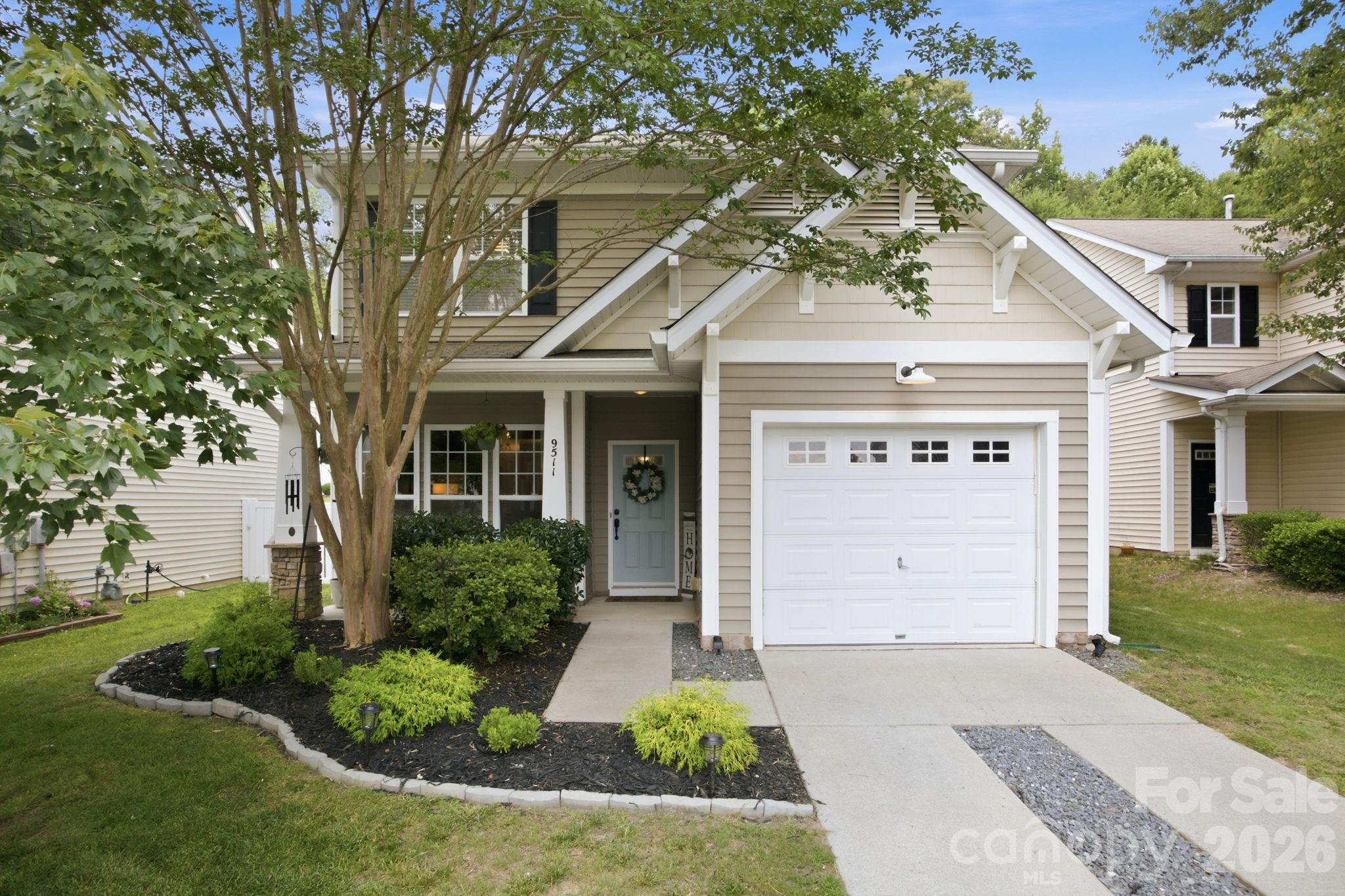Welcome home to 9511 Long Hill Drive! Nestled in the highly desirable Riverbend neighborhood, this lovely 3-bedroom, 2.5-bathroom home offers the perfect blend of everyday functionality and vibrant community living.

The charming front porch guides you inside to a bright, open-concept main floor with luxury vinyl plank flooring, designed for seamless entertaining and comfortable daily life. The heart of the home features an open plan kitchen with island and pantry closet. The 2022 updated fridge conveys with the home. The kitchen flows effortlessly into the bright main living room featuring a fireplace with gas logs. A stylish dining room and half bath complete the main level. Upstairs, you’ll find a spacious primary suite with vaulted ceiling, ceiling fan, and windows overlooking green space in the back - there is no home directly behind. The primary suite includes a full bathroom and ample walk-in closet space. Two secondary bedrooms, both with ceiling fans, share a full bathroom. The laundry room, with washer and dryer included, is also upstairs.

Step out back to your spacious and private fenced backyard backing up to mature trees. Enjoy the patio, perfect for weekend BBQs, and relax in the hammock beneath the weeping willow tree. The attached one-car garage offers additional storage or parking.

Living in Riverbend means you're just a short walk away from top-tier community amenities, including green spaces, playgrounds, beach volleyball, and the neighborhood's signature outdoor pool featuring an incredible waterslide!

Enjoy the peace of a welcoming suburban pocket while staying just minutes from Mountain Island Lake and major shopping hubs. Easy access to Hwy 16 and I-485 allows a convenient commute into Uptown Charlotte and quick access Charlotte Douglas International Airport.

If driving from Hwy 16/Brookshire, then Rozzelles FerryRd, GPS may direct you to take a right on Hart Rd - Take the NEXT RIGHT on Winding River Drive so you can see the main entrance of Riverbend and pass the pool and playgrounds on the way!