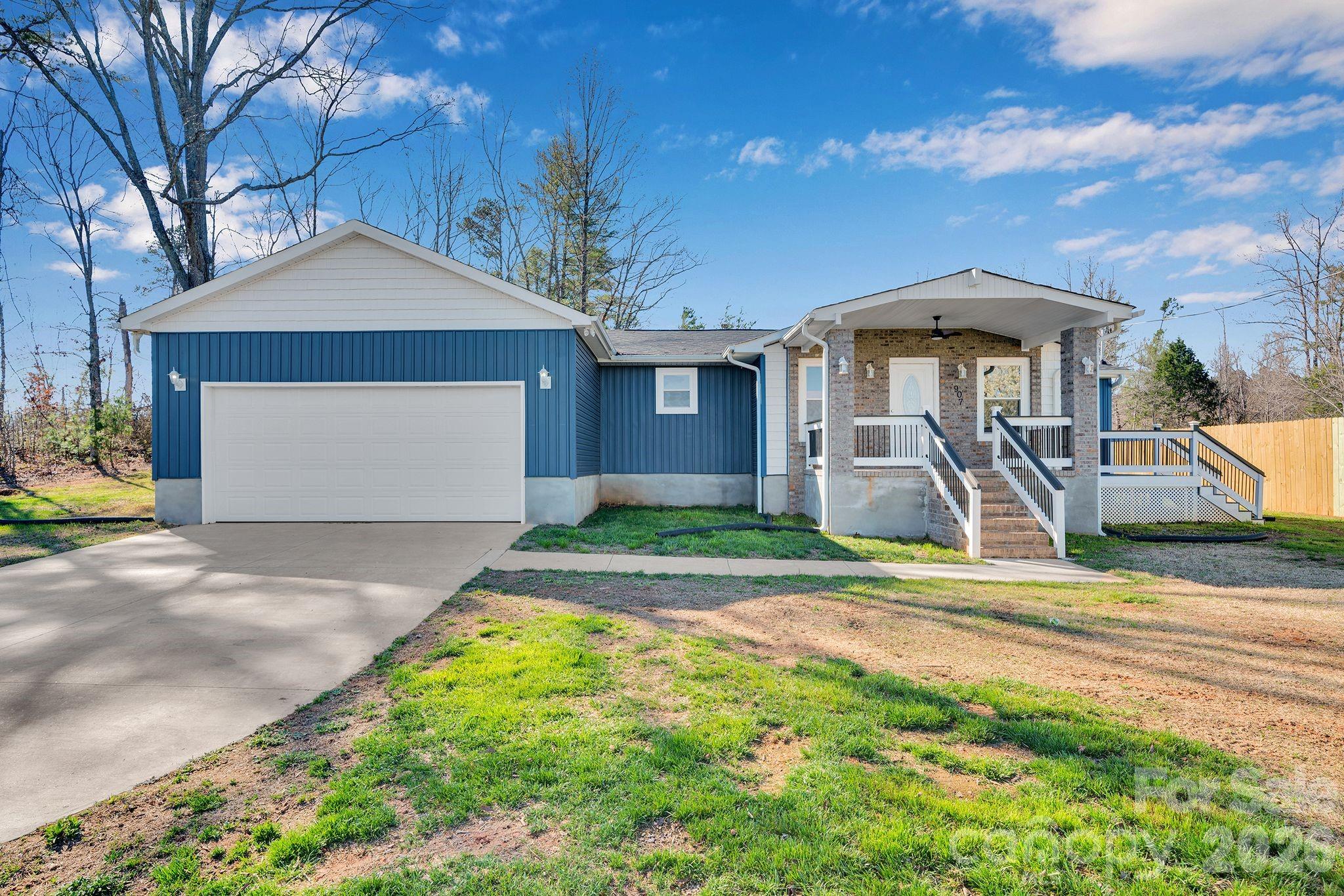 Welcome to this beautifully renewed 3-bedroom, 2-bath home at 907 Carpenters Grove Church Road, offering that essentially brand new feel in peaceful Lawndale, NC. Originally a 2-bedroom, 1-bath, this residence has been thoughtfully expanded and updated inside and out to create a modern, move-in-ready retreat. Step inside to an inviting open-concept living and kitchen area that makes everyday living and entertaining feel effortless. The kitchen showcases updated appliances, contemporary finishes, and great flow to the main living space, so you’re always connected with family and guests. With three comfortable bedrooms and two refreshed full baths, there’s room for everyone to spread out and enjoy their own space. Nearly every major feature has been redone, including a new roof, updated appliances, and a newly added bedroom and bath, giving you the peace of mind that comes with a comprehensive renovation. Central heating and cooling, ceiling fans, and a dedicated laundry room add everyday convenience and comfort. Outside, the home sits on an approximately 0.27-acre lot, providing manageable yard space for pets, play, or a garden without overwhelming maintenance. An attached 2-car garage offers covered parking and extra storage, a rare bonus at this price point. The classic mix of brick, vinyl, and wood exterior delivers charming curb appeal that fits right into the surrounding countryside. Located just a short drive from area conveniences, schools, and neighboring towns, this property combines small-town tranquility with everyday accessibility. If you’ve been searching for a freshly updated, turnkey home where all the hard work has already been done, 907 Carpenters Grove Church Road is ready to welcome you home. Schedule your showing today and see this revitalized gem in person!
