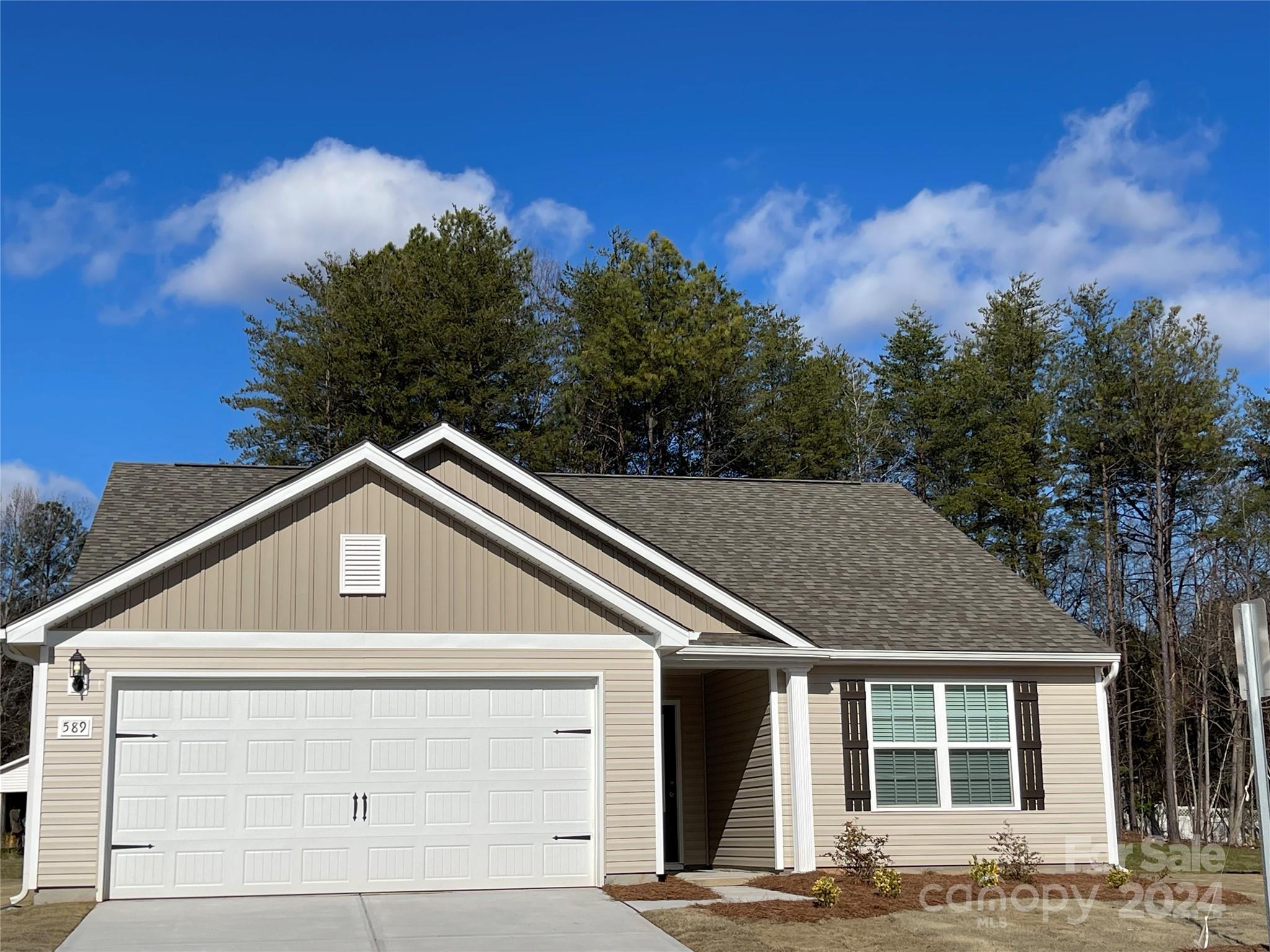 This brand new home features a bright, open floor plan.  Kitchen and dining room are open to the living room for easy entertaining and living.  Your new home is complete with granite counters, Whirlpool stainless steel appliances which includes refrigerator, dishwasher, oven and microwave.  Primary suite is spacious with a vaulted ceiling and large walk-in closet and private bath. This home sits on one of our largest lots with a beautiful back yard.  Enjoy our neighborhood park and let your furry friends enjoy the dog park.  Just minutes from Rock Hill and easy access to Charlotte.