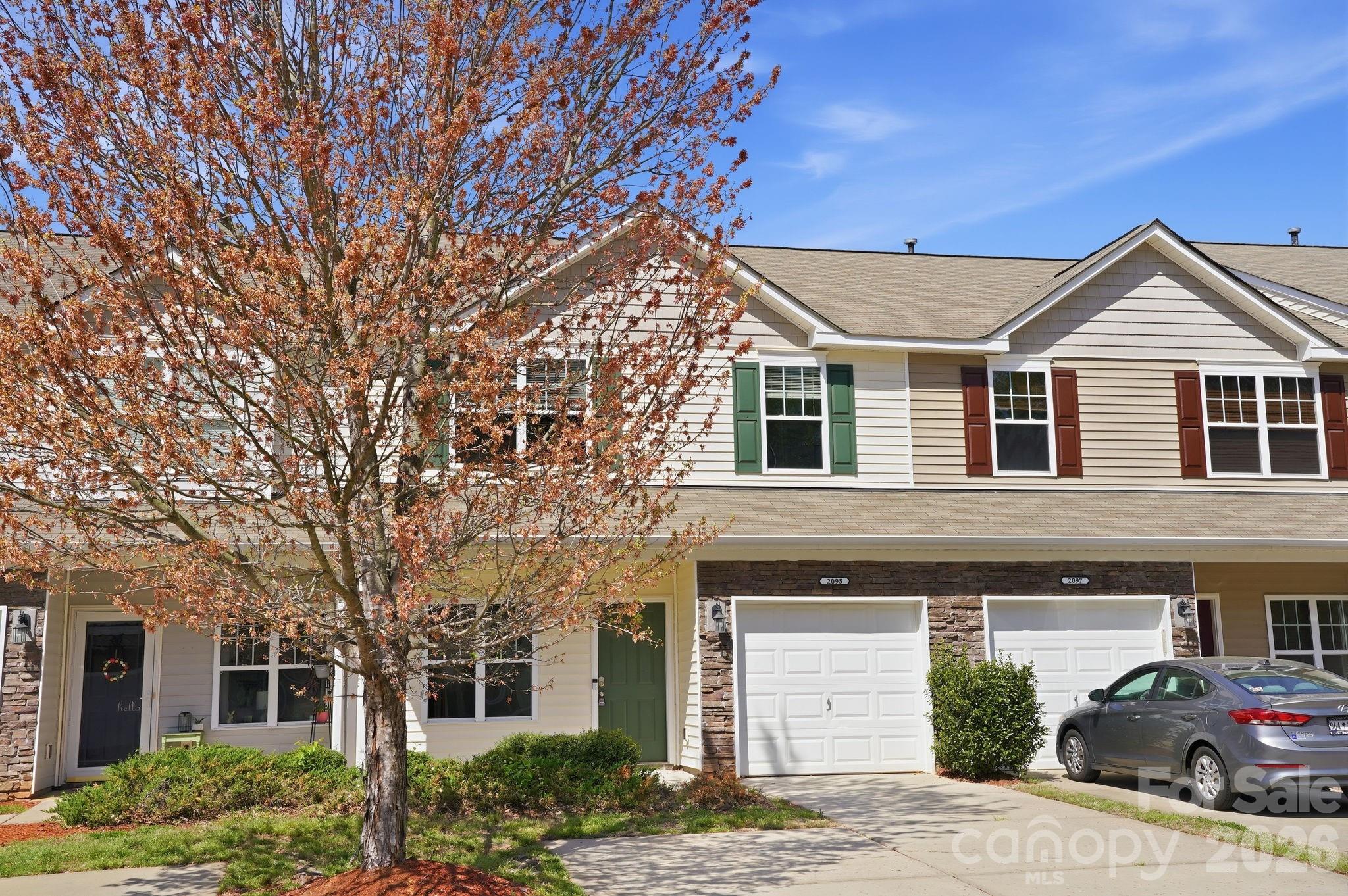 Welcome home to this spacious and versatile 2-bedroom, 2.5-bath townhouse in the Lake Wylie area! This well-designed two-story home offers flexible living spaces ideal for today’s lifestyle. The main level features an open-concept living and dining area, along with a recently updated kitchen showcasing granite countertops, ample cabinetry, and plenty of workspace—perfect for everyday living and entertaining. A convenient half bath on the main floor adds extra functionality for guests. Upstairs, you’ll find two generously sized bedrooms, each with its own private en-suite bathroom. Adjacent to the primary bedroom is a cozy sitting area that would make an excellent nursery, home office, or flex space—whatever suits your needs. A spacious loft area with a closet offers even more versatility and could easily be converted into a third bedroom, play room, or additional office space. New carpet was just installed upstairs. Step outside to enjoy the fenced patio, providing privacy and a quiet outdoor retreat ideal for relaxing or entertaining. Additional highlights include low-maintenance living, great storage throughout, and a prime location close to shopping, dining, Clover schools, and Lake Wylie.  SELLERS ARE OFFERING $2,500 TOWARDS BUYER'S CLOSING COSTS OR TO BUY DOWN THE INTEREST RATE!