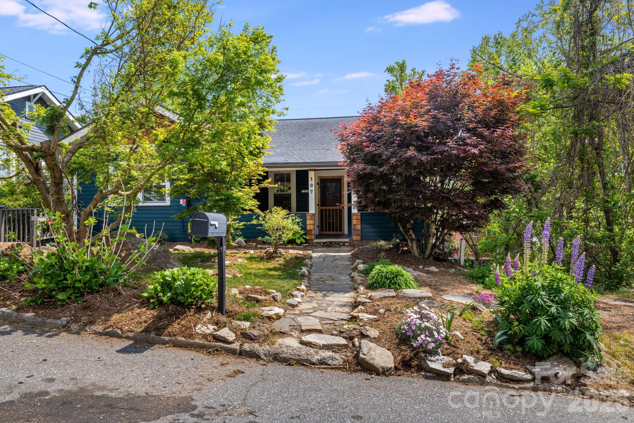 Experience the perfect blend of historic soul and modern sustainability. Located in Montford near Downtown Asheville, this income-producing 1927 triplex offers the charm of the neighborhood without historic district restrictions. This versatile property is move-in ready for its next chapter, whether as a high-performing investment, a multi-generational compound, or an owner-occupied "house hack." Main level, designed to live like a true single-family home. Features 2 bedrooms, a versatile flex room, and 2 full bathrooms. Significant 2024 updates include a fully renovated kitchen, refinished original wood floors, fresh interior paint, and newer HVAC system. Two additional units; both lower units offer private entrances, dedicated balconies, and in-unit laundry hookups. Both units renovated in 2015 with updated kitchens with stainless steel appliances. Middle unit is a spacious, character-filled 1-bedroom with a walk-in closet and HVAC replaced in 2017. Lower unit is an efficient studio with a newer mini-split installed in 2024. Property is efficient with an integrated solar panel system providing significant energy savings and equipped with a tesla ev level 2 home charging connector. The entire exterior was professionally painted in 2026, offering fresh curb appeal. The 0.16-acre lot is a private sanctuary featuring a landscaped backyard with natural stone accents, a built-in fire pit, and a wooded perimeter. Each unit enjoys its own outdoor space, and the property offers two dedicated off-street parking spaces plus additional street parking. This property offers a rare combination of historic character and modern efficiency. Nestled near Montford this gem offers a unique blend and Victorian history and scenic landmarks. Explore this accessible neighborhood, scenic landmarks and is conveniently located near downtown Asheville's vibrant culinary, music and art scene. Don’t miss this unique opportunity—schedule your showing today!

Please refer to agent remarks for showing time instructions or contact listing agent for details. Please do not disturb the tenants.