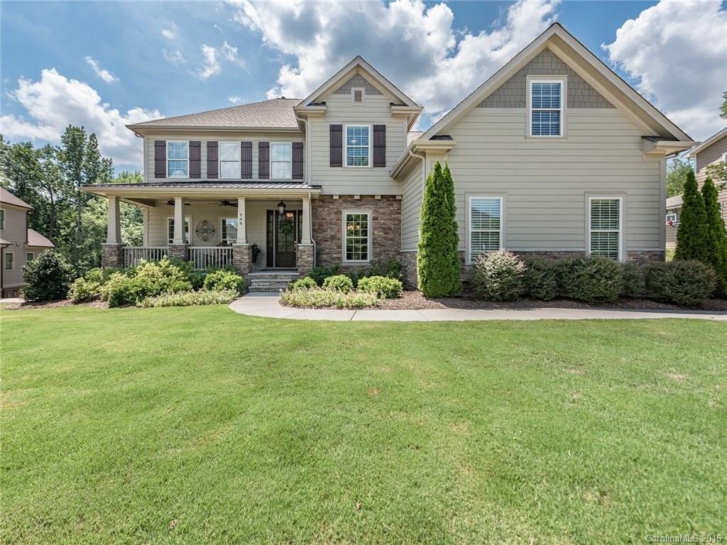 Elegantly Flowing, Gracious in Every Detail! Private Golf Course lot. Front Porch & Screened Porch. Private Patio w/fire pit! Featuring: extensive millwork, wainscoting, columns, arches, tray ceilings, skylights. Master Suite w/his & her walk-in closets; garden tub & shower. Open Kitchen w/long built-in bar & ambient, corner fireplace. Abundance of windows creates open, airy feel. Bonus w/cooler & bar. Loft w/built-in desks. Set in amenity rich Springfield w/Ft Mill schools & minutes from I-77!