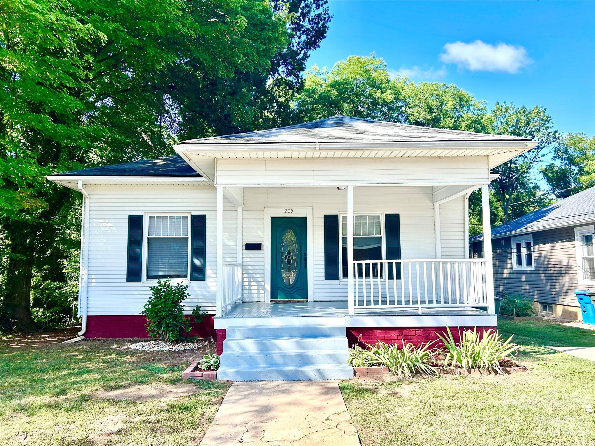 Charming 1923 Craftsman in desirable Fulton Heights! This inviting home features a spacious front porch (approximately 16' x 10') perfect for relaxing, along with a rear deck (approximately 15' x 8') overlooking a deep, semi-private backyard.

The flexible floor plan offers up to four bedrooms, or the option to dedicate one room as a home office, hobby space, or guest room. Energy-efficient windows offer comfort and value. Recent updates include fresh interior paint, new appliances, new countertops, new carpet in two bedrooms, and new linoleum flooring in the kitchen and bathrooms. 
The living room fireplace is believed to be inoperable and conveys as-is. A large 1,097-square-foot basement, accessible from both the interior and exterior, provides abundant storage, workshop potential, or future possibilities.

Offering one full bath and two half baths, this well-maintained, low-maintenance home is ready for its next owners.

Conveniently located near downtown Salisbury, shopping, restaurants, breweries, theaters, parks, and I-85, you'll enjoy easy access to everything the area has to offer. Schedule your showing today!