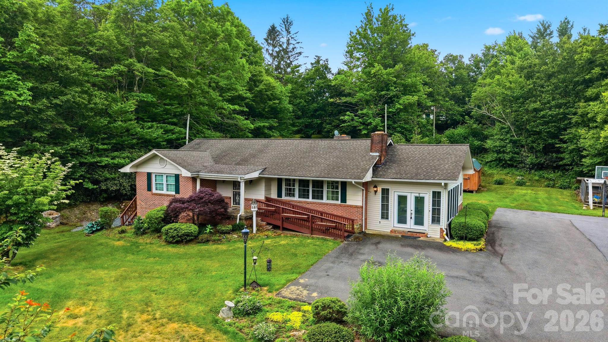 For the first time since it was custom-built in the 1970s by the current owner, this cherished brick home is ready for its next chapter. This beautiful home in the Jonas Ridge community has 3 bedrooms, 2.5 baths, a full basement, a 1.59 acre lot, and a 12x28 outbuilding. 

Cool mountain elevation is approximately 3,750 FT and just about 2 miles to a Blue Ridge Parkway entrance.

Natural gas furnace, central A/C, and Rinnai tankless hot water heater. Family room addition has monitor-type heating and loft area above is not included in heated square footage due to ceiling heights. Also not included in HSF is sunroom/ laundry/storage.

Priced attractively to accommodate any repairs and updates needed. Ask your agent for copy of pre-listing home inspection.

Spectrum fiber internet is in the area. Buyer to confirm availability to this property with Spectrum.
