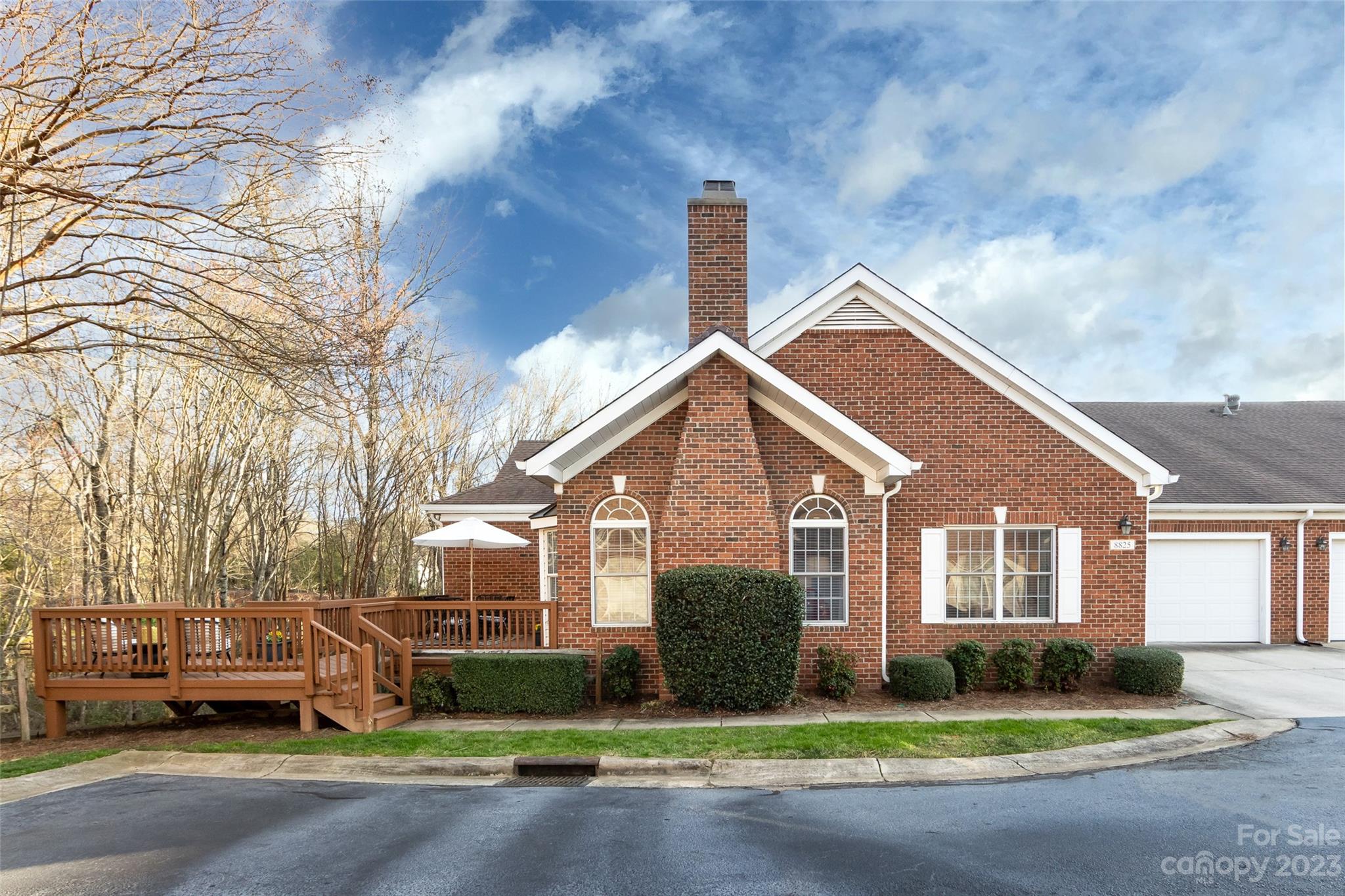 Beautifully updated home in desirable Windsor Oaks. Only one of six larger patio homes with a finished basement. Cul-de-sac location overlooks a wooded area. Great outdoor space with front deck and lower level patio. With over $50k in recent updates, this home is MOVE IN READY! Gorgeous Shaw Floorte Hickory Hardwood flooring added to both levels. Light & airy, this home's large windows, cathedral ceiling and open floor plan make this the perfect home for easy living. Kitchen features real wood cabinets, new granite counter, tile backsplash, stainless appliances. All new faucets and lighting fixture updates. The main level has the primary suite, bathroom, a secondary bedroom, full bath, office, laundry/drop zone. Downstairs walkout basement features a large entertainment room, bedroom, full bath, flex space for exercise or craft room and an unfinished utility room with amazing storage. This home is private and tucked away but convenient to Ballantyne shopping, restaurants and amenities.