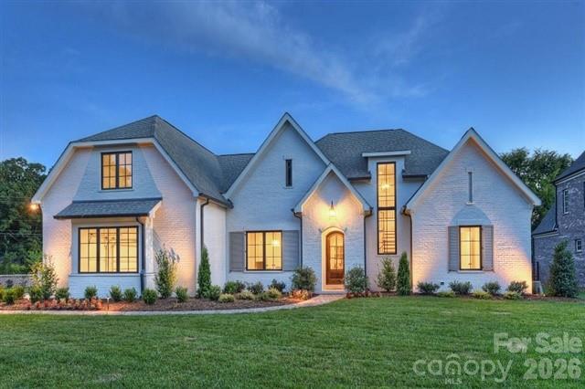 Proposed Custom Home by Luxury Builder Simonini.  

Rare opportunity to build your dream home on one of the final available lots in the highly desirable Narrow Passage community! Crafted by renowned luxury builder Simonini, this thoughtfully designed home seamlessly blends architectural elegance, high-end finishes, and functional living.

Property Highlights
Main-Level Living: Features an expansive primary suite on the main floor, providing a private retreat with luxury amenities.

Gourmet Chef's Kitchen: Equipped for top-tier culinary experiences, complete with a dedicated scullery for seamless entertaining and clean, clutter-free prep space.

Open & Airy Layout: An inviting, light-filled open floor plan designed for effortless flow between the kitchen, dining, and main living areas.

Upper-Level Retreat: Offers 3 spacious en-suite bedrooms, an expansive bonus room, and a dedicated study loft—ideal for working from home or relaxed multi-generational living.

Generous Parking & Storage: Includes a spacious 3-car garage.

5 Bedrooms | 5 Full Bathrooms

Unbeatable Davidson Location
Enjoy prime convenience just minutes from:

Historic Downtown Davidson, bustling with top-rated restaurants, charming boutiques, the popular Saturday Farmers Market, and Davidson College.

Premier recreational destinations including River Run Country Club, Fisher Farm Park, and Summit Farms.

Convenient to Lake Norman, Uptown Charlotte and Charlotte- Douglas International Airport. 

Lot is listed separately as MLS#4395729