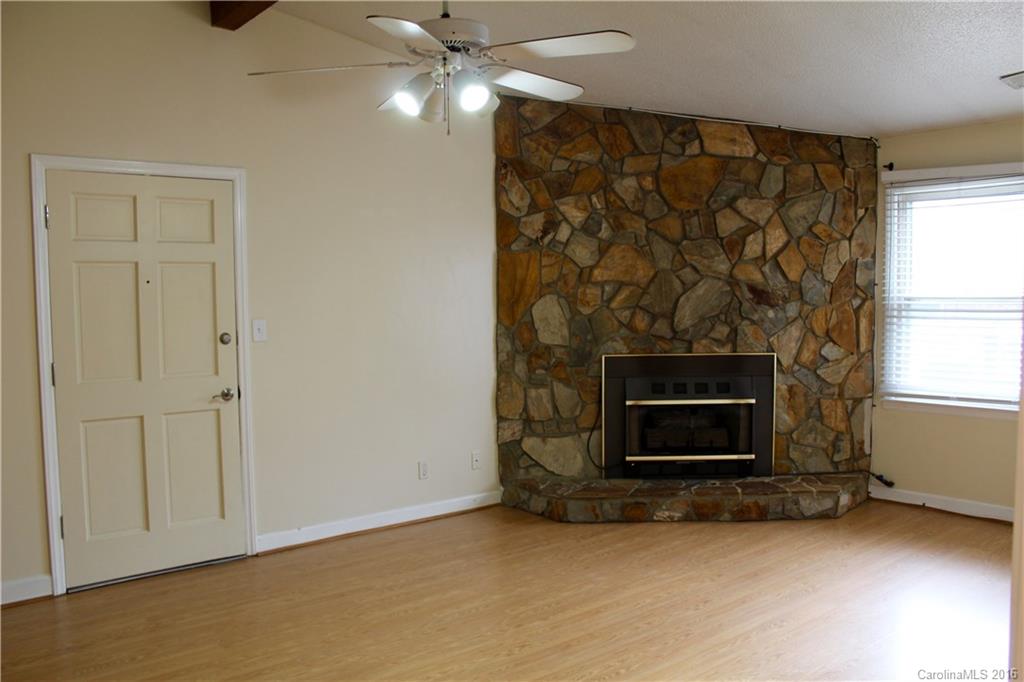 Enjoy evenings by the fireplace or relaxing on the screened porch. Charming condo featuring 2 beds/2 baths. Kitchen equipped with refrigerator, stove, microwave and dishwasher. Great location! Just minutes away from shopping and dining. Community pool. Priced to sell! Property is being sold AS IS.