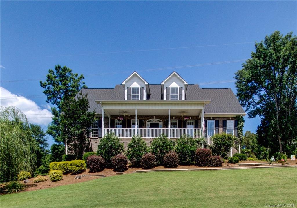 Beautiful, well kept custom home in prestigious Catawba Crest; This home has it all and is perfect for entertaining w/the Great Room accessing front & rear coverd porches; French doors lead to a landscaped backyard & an open green space to play; NEW SS App & pristine Hardwood floors on main level; Enjoy coffee in the morning rm while watching the sunrise or sit on your porch w/ cool iced tea while enjoying your waterview across the street; Clover schools & low SC taxes.