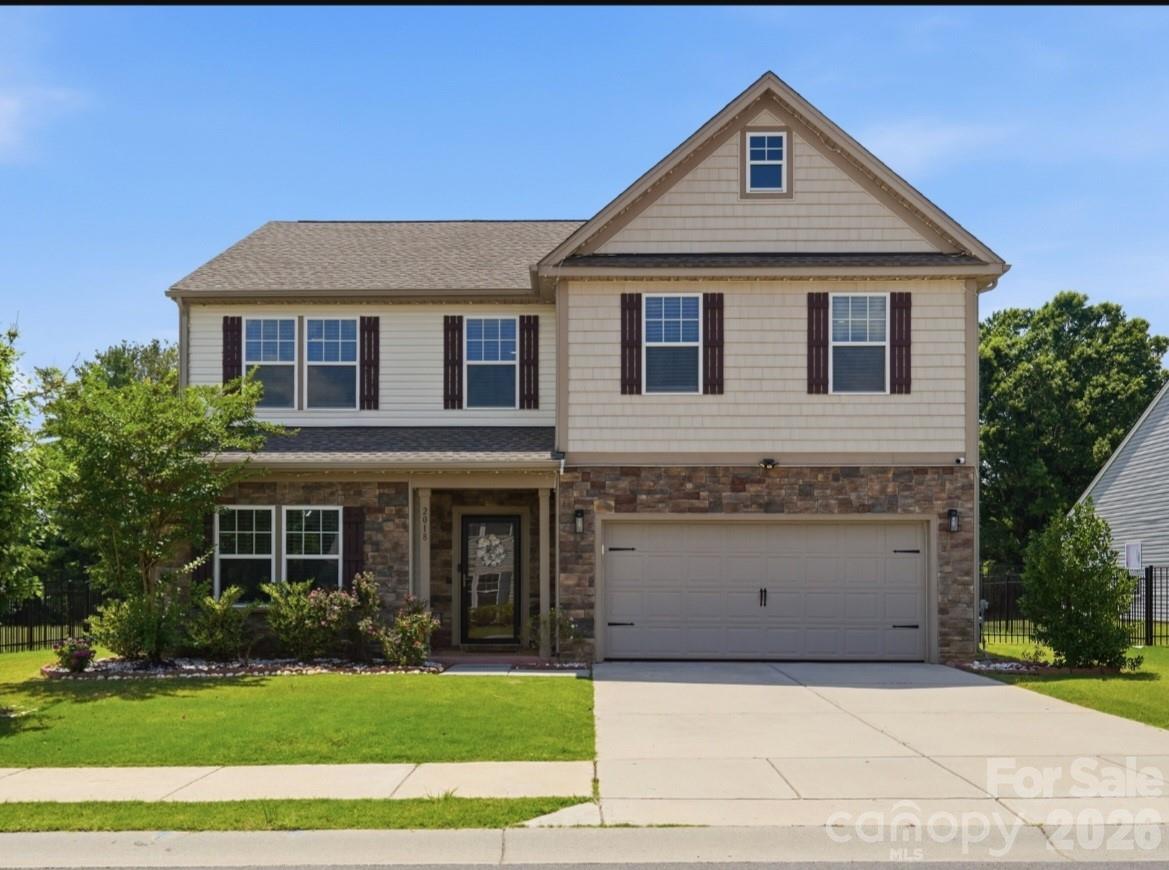 BETTER THAN NEW!! PREMIUM LARGE HOMESITE!! WEDDINGTON SCHOOL DISTRICT!! GORGEOUS TRADITIONAL STONE STYLE ELEVATION showcase home in CREEKS LANDING w/ all the bells and whistles of the neighborhood's highly decorated models- UPGRADED EVERYTHING! Plus MANY ADDITIONAL UPGRADES BY OWNER! This super popular floorplan was designed with all the extras - modern open floorplan, large chef's kitchen w/ island, granite countertops, farmhouse sink, beautiful tile backsplash, range hood, and wood shelved pantry ... Extensive custom moldings throughout the home, laminate wood flooring EVERYWHERE - NO CARPET ANYWHERE!! This elegant home is beaming w/ natural lightness & brightness - Luxury lighting and ceiling fans throughout, added recessed lighting in multiple rooms, hardwood staircasing, epoxy patio & garage, 10 x 12 outdoor shed AND MORE!! The 5BR/3BA Kipling model has plenty of space for entertaining, working from home, and hosting guests! Whether enjoying the inviting floorplan inside or the private flat backyard w/5ft fencing outside, this home has it all! Great east-facing location, awesome neighborhood, amazing home - open yet cozy, traditional yet modern and desirable yet PRICED TO SELL! ***Come see!***