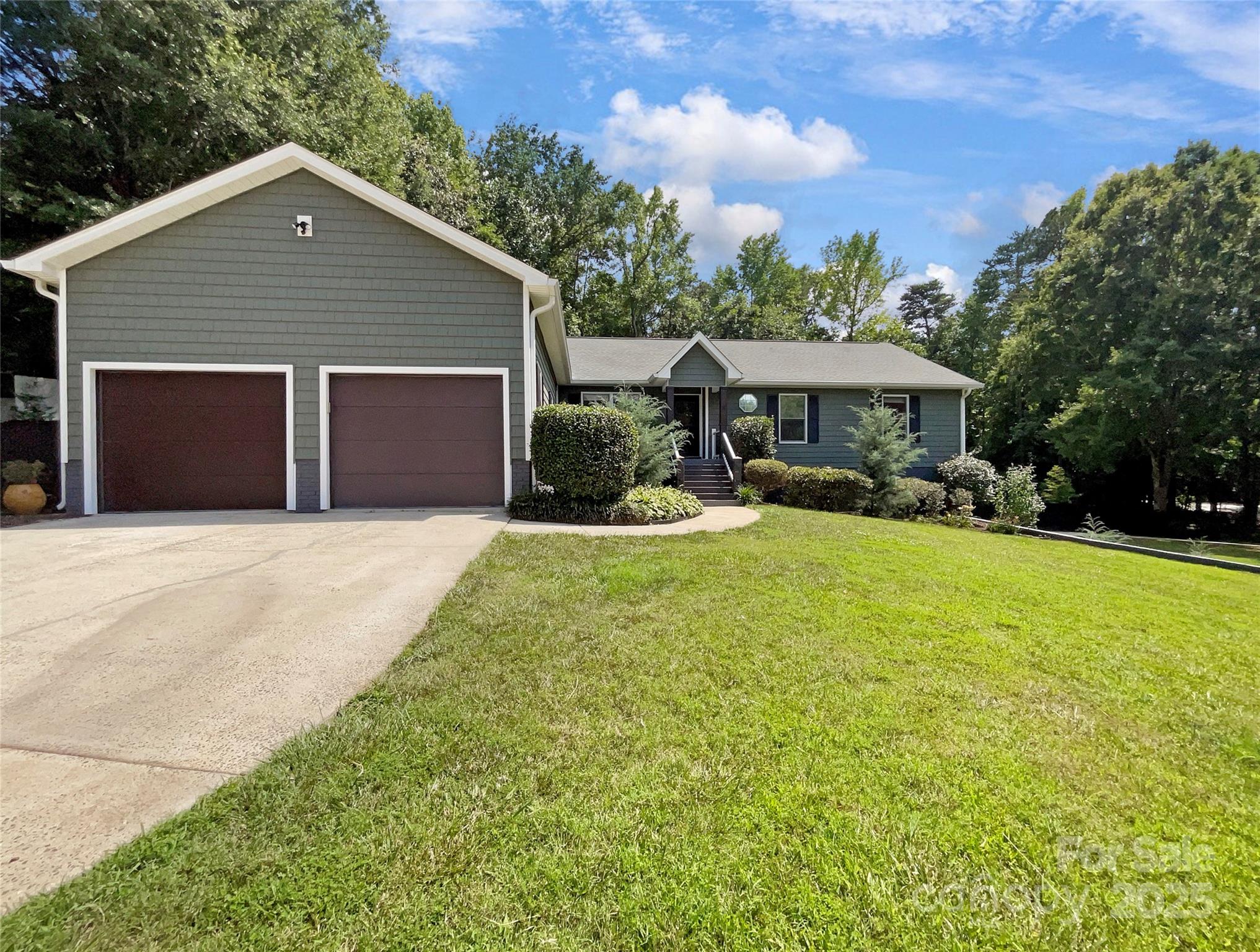 Seller may consider buyer concessions if made in an offer. Welcome to the comfort of a home designed with tasteful modern features for your convenience. Unwind by the cozy fireplace, which adds a warm ambiance to this unique home. Step into the heart of the home—the kitchen—complete with a striking accent backsplash and plenty of stainless steel appliances. The primary bathroom is a sanctuary featuring double sinks for convenience and a separate tub and shower for a spa-like experience at home. Expand your living space with a deck ideal for enjoying the peaceful surroundings. The fenced backyard offers added privacy and security. This property seamlessly blends aesthetics and functionality, providing a perfect sanctuary for those who appreciate quality and style. Don't miss out on the opportunity to make this home yours—a space tailored to your taste and comfort.