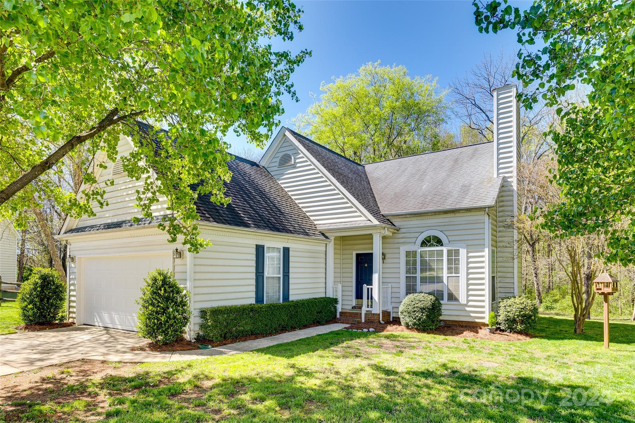 This one-owner home in Charlotte's Yorkshire neighborhood sits at the end of a cul-de-sac and has an extraordinary large back yard which backs up to a preserved natural area.  The home offers a wonderful layout and is ready for your cosmetic updates.   The spacious living room has a wow factor with its soaring vaulted ceiling and a gas fireplace. The kitchen, breakfast nook and dining room have tons of natural light as it overlooks the wooded back area.  The first floor primary offers an ensuite and walk-in closet with plenty of space. Upstairs, you'll find the two additional bedrooms and a large loft area, perfect for a home office.  Be sure to take a look at this lovely home in person!