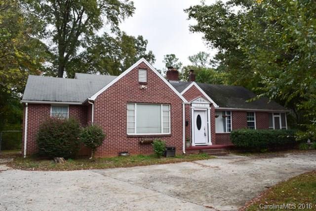 AS IS SALE  This ranch home is located in the heart of Rock Hill, minutes from Downtown and the University.  Home features nice hardwoods throughout all areas and tile flooring in kitchen as well as bathrooms.  Woodburning fireplaces in great room, living, and master bedroom. Very large bedrooms rooms for added storage space!  Super private back yard, fully fenced with huge lot. Makes for a lovely first time home or investment opportunity! Pool will remain.