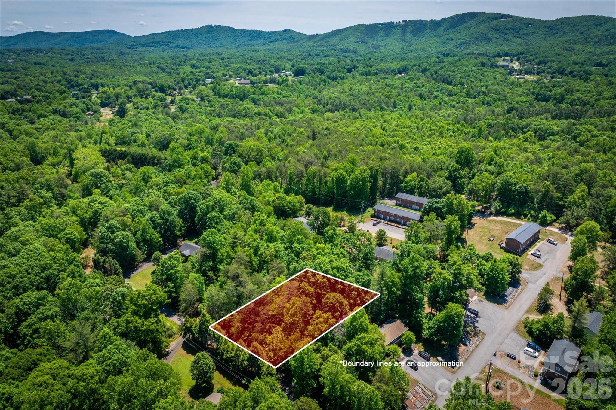 Ready to build your dream home? This vacant lot is sitting pretty in Valdese, just waiting for someone to come along. The location is a real winner- you have easy access to Interstate 40, making commutes and errands a breeze. If you're planning to build a cozy home tucked into the foothills of North Carolina, this property gives you the blank canvas to make it happen. Small-town charm meets everyday convenience right here.
