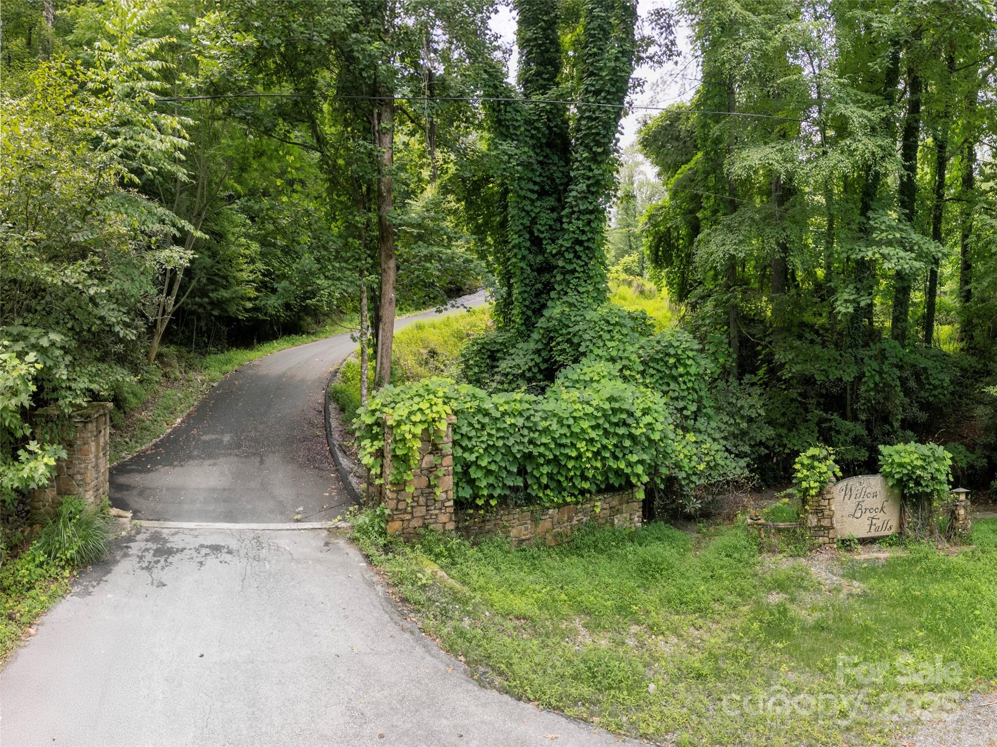 A rare opportunity to own or develop in one of Hendersonville’s most sought-after areas...just minutes from downtown and the prestigious Champion Hills Country Club. This boutique 12-lot minor subdivision features gently sloping, wooded parcels ranging from 0.65 to 1.99 acres, offering a serene, natural setting with modern convenience. Whether you're a builder, investor, or future homeowner, this peaceful community offers the perfect blend of privacy, nature, and location. Don’t miss your chance to be part of this unique enclave in one of Western North Carolina's most desirable destinations, with infrastructure in place and development-ready lots. Bring your house plans!