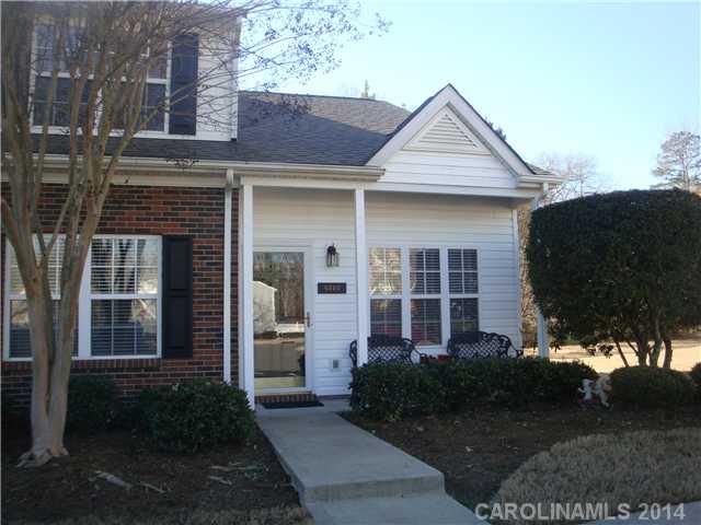 Well maintained end unit with an unheated sunroom on rear,unit backs up to woods, master on main, 2 bedrooms up with full bath, one bedroom could be a loft area, granite counter tops in kitchen,USDA 100 percent financing available, 2 assigned parking spaces, trash pick up included in HOA dues, walking distant to pool , Indian Land schools