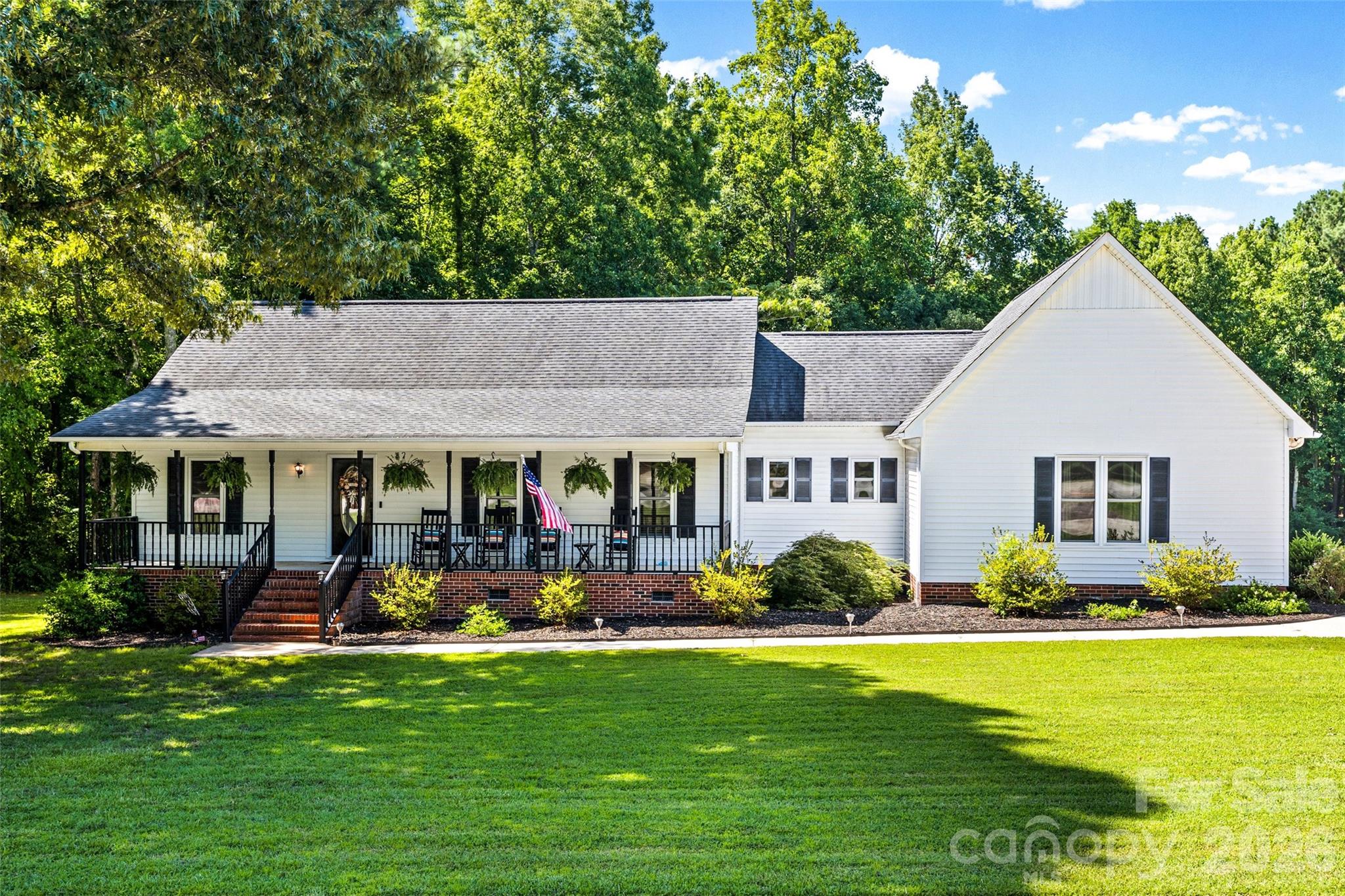Welcome home to this beautifully updated ranch where comfort, space, and country charm come together. Thoughtfully remodeled with today's lifestyle in mind, the main living areas have been opened up to create a bright, welcoming floor plan that's perfect for everyday living and entertaining.

The spacious primary suite has been redesigned to a newer floor plan featuring double closets, a private en suite bath, and its own exterior door leading directly to the expanded back deck—the perfect spot to enjoy your morning coffee or unwind in the evening.

Additional updates include a beautifully renovated hall bathroom, new flooring throughout, and a hard-wired surround sound system for the ultimate movie or game-day experience.

Need extra space? The versatile recreation room with a built-in bar and pool table can easily serve as a game room, home gym, media room, or home office to fit your lifestyle.

Step outside to your own backyard retreat featuring an enlarged deck, refreshing pool, and a private wooded yard offering plenty of room to relax and entertain.

Enjoy the freedom of no HOA, no city taxes, and no restrictions, all while embracing peaceful rural living. Bring your feathered friends and start your own garden. Conveniently located just minutes from Highway 5 Bypass and Highway 49, you'll enjoy the best of country living with easy access to shopping, dining, and commuting.

This home offers the space, flexibility, and privacy you've been looking for—come see why you'll never want to leave!