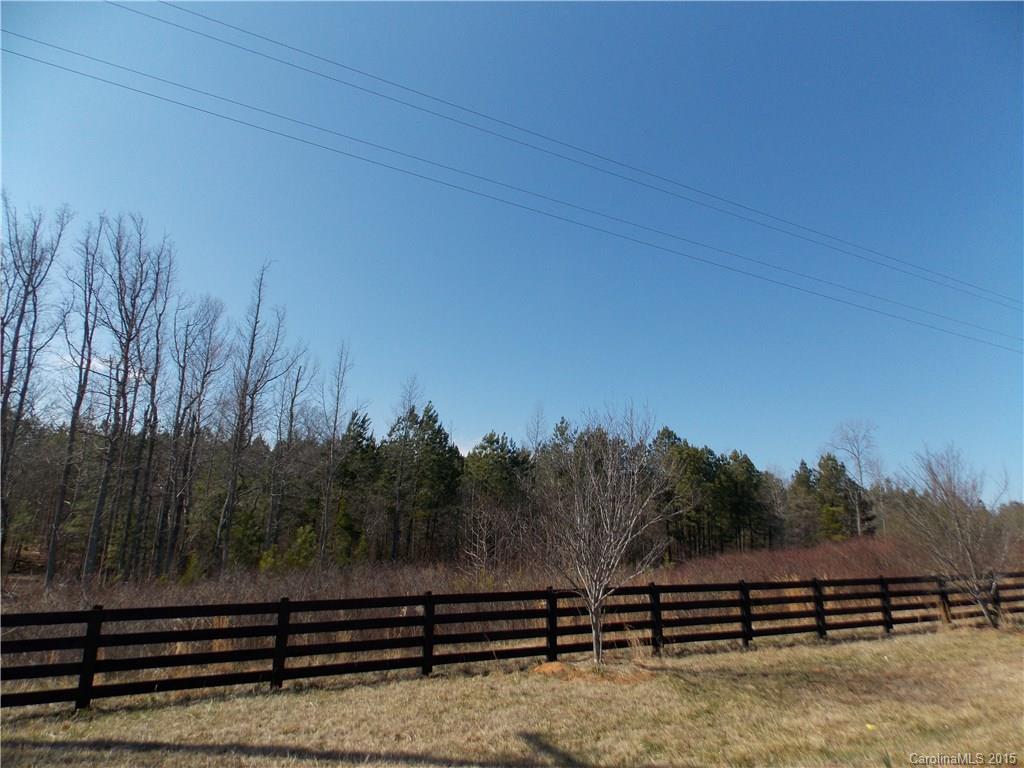 This beautiful lot is lined across the front with black 4-board black equestrian style fence and Purple Plum trees. Enjoy quiet county living yet minutes from many attractions: Downtown Historic York, Bratttonsville, and Lake Wylie. Also just a short drive to downtown Rock Hill and the Galleria Mall.