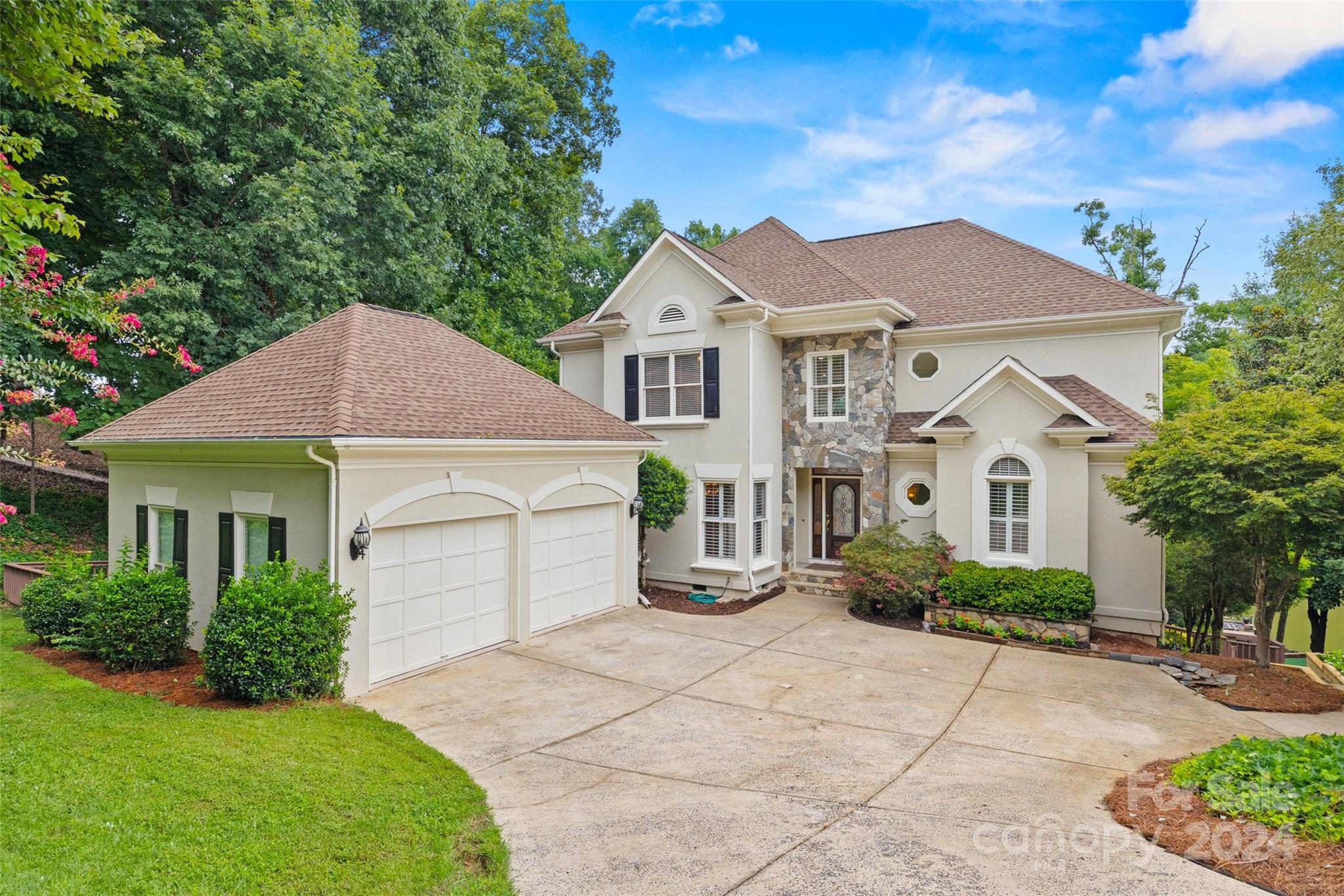 Make an appointment to see this cul-de-sac home with basement on a deep water lot NOW! Move in ready, open floor plan and water views from almost every room! Main level entry from garage to laundry, tall soaring ceilings in main great room with fireplace, primary bedroom also features a fireplace, luxury bath with jetted tub and walk in tiled shower. Kitchen has lots of cabinets for storage, spacious built in refrigerator. Upstairs you will find bedroom 2 and 3 & a massive bonus/loft area. Basement has wet bar, bedroom, full bath with living /rec room. Tons of space to entertain and relax with outdoor features like a hot tub, pool, fire pit, screened porch, two large decks with water views, boat dock, even a putting green! Riverpointe located in the heart of the Lake with easy commutes to Int. Airport, hospitals, dining and shopping! Private dock has boat lift, as well as a personal watercraft lift with DEEP water. Located across the private cove are woods of McDowell Nature preserve!