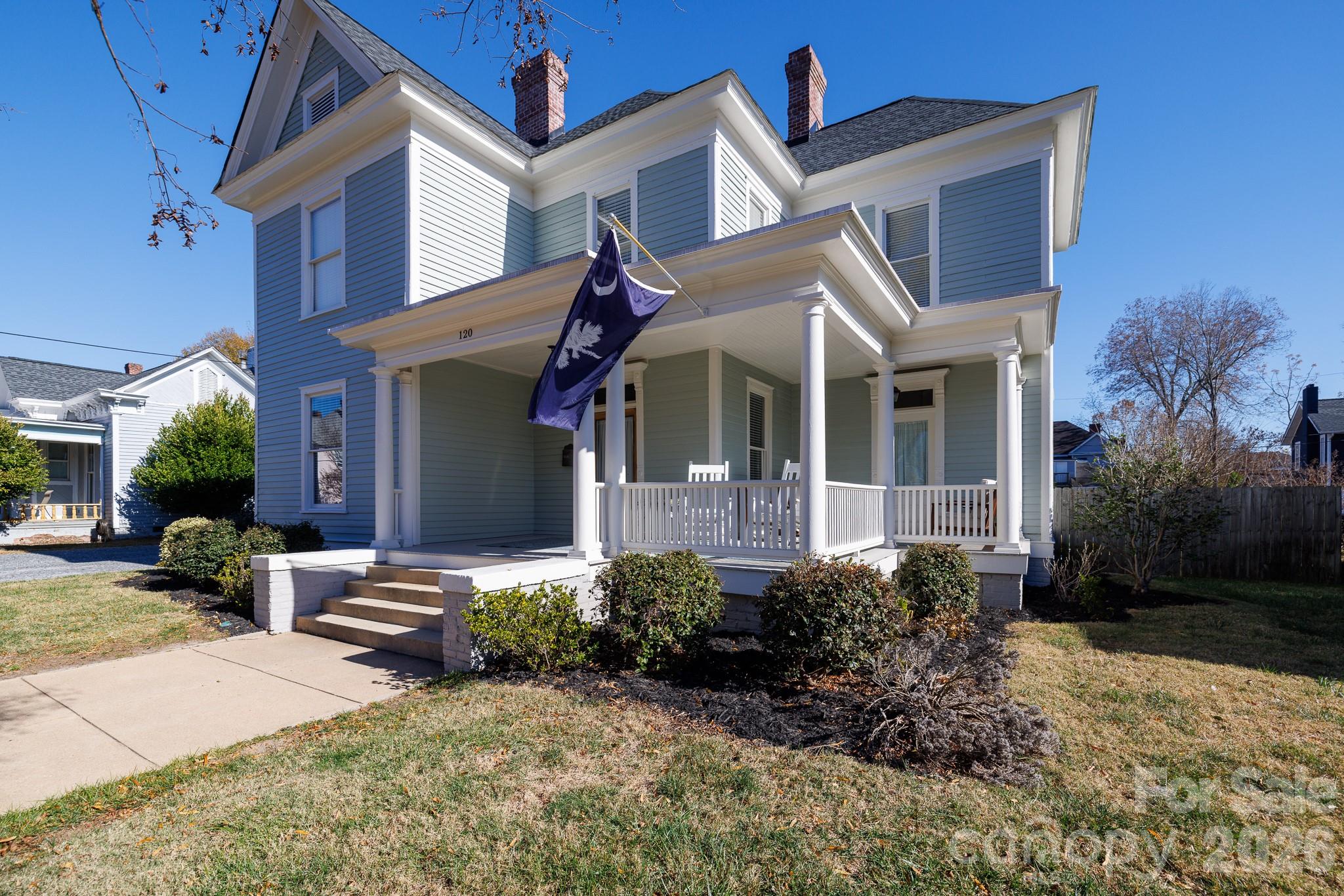 Welcome to the Dacus House in the Rock Hill historic district on the highly coveted Reid St - only a block from Fountain Park & downtown Rock Hill restaurants and events. This charming home was renovated just a couple of years ago to its former glory. It is the perfect mix of modern features and historic charm that every buyer will love. 
The spacious bedrooms all feature the original fireplaces and mantels and original pine floors. The open floor plan downstairs is the perfect setting to host family and friends for the Summer. Come relax on the front porch and enjoy the art district downtown Rock Hill. Don't miss this rare home that will only come along once in a blue moon! This home is on the National Register and under Rock Hill historic district guidelines.