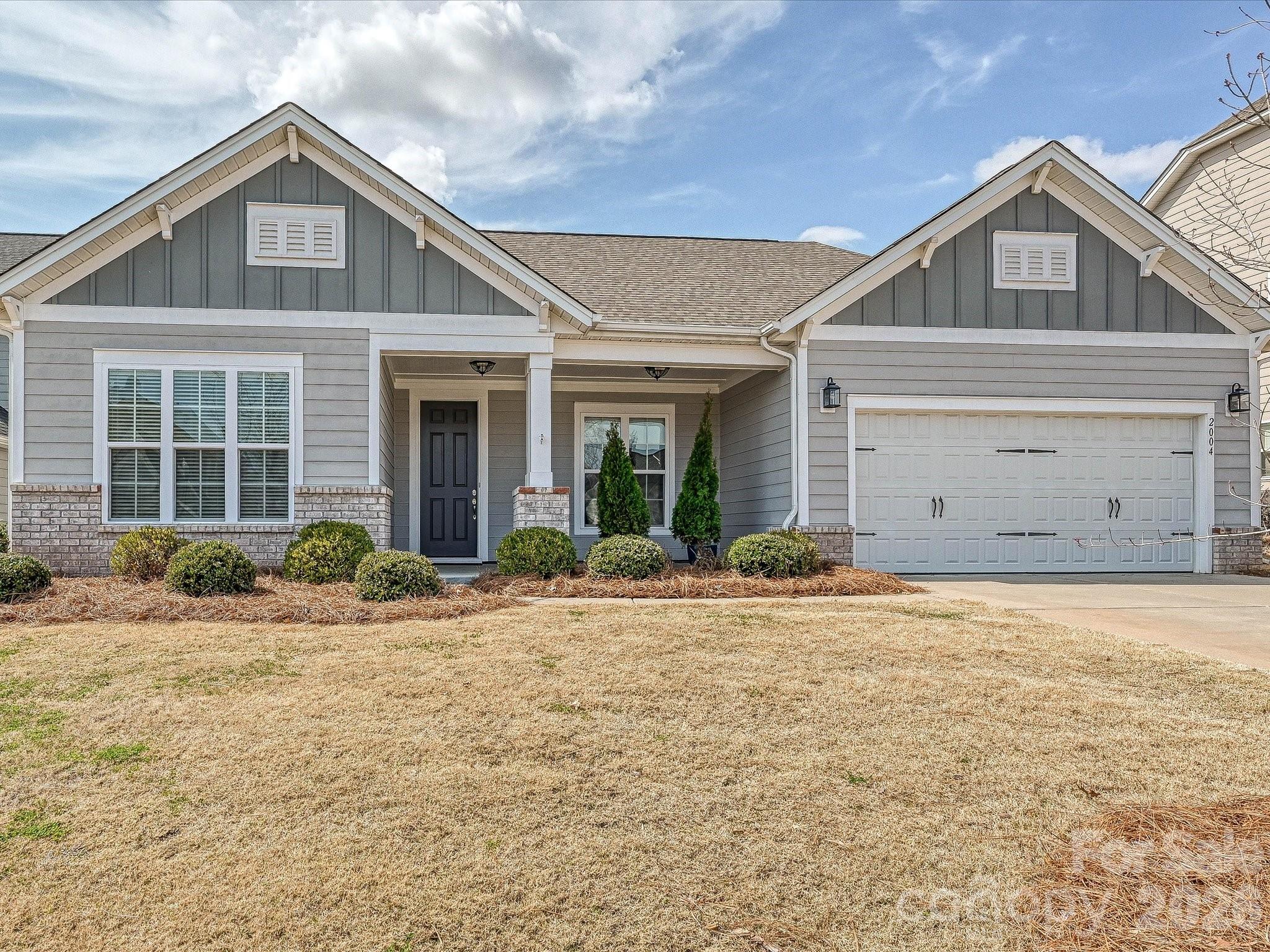A meticulously maintained Ranch home in Belmont’s popular 'Overlake' community; this welcoming 3-bedroom, 2.5-bath residence pairs an open, gracious floorplan with thoughtful outdoor living and attractive community amenities (outdoor pool, playground, sidewalks & walking trails).
Bright living areas flow easily to an oversized patio with a retractable awning — ideal for entertaining — while professional landscaping completes the curb appeal.  Attached two-car garage provides convenient parking and additional storage options. 
This property offers gracious, open living and thoughtful outdoor spaces.  Beautifully maintained and move-in ready, it combines comfort, convenience, and access to excellent amenities for an ideal single-level lifestyle.