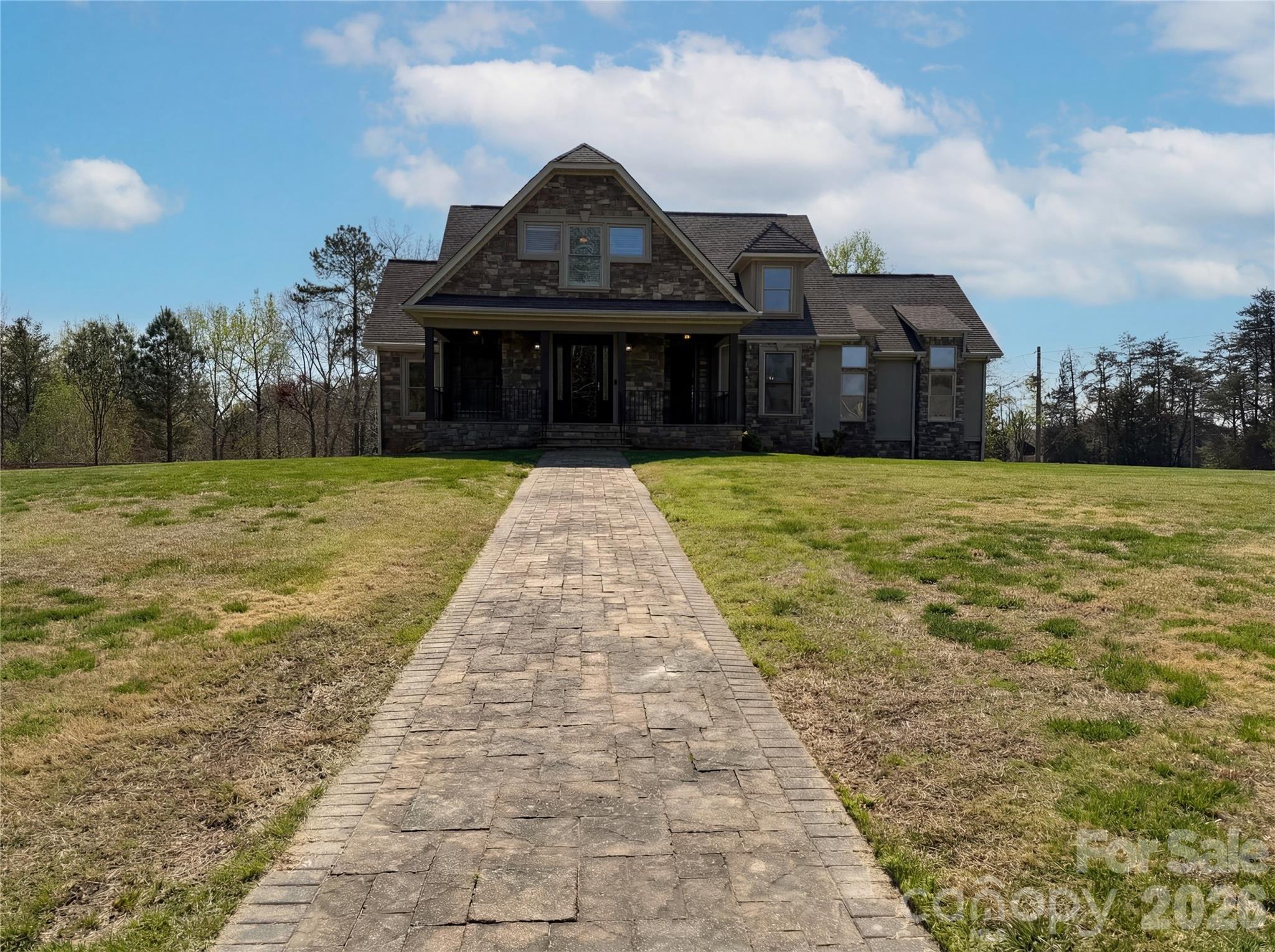 Welcome to 2016 Rocky Stream Rd, where a beautifully updated interior blends comfort and style throughout. The kitchen features an eye-catching accent backsplash, stainless steel appliances, and a central island that enhances both flow and functionality. A fireplace anchors the living space with warmth, while the primary bedroom with double closets for ample storage. The primary bathroom is well-appointed with dual sinks and a relaxing jacuzzi tub. Fresh interior paint and new flooring create a bright, refreshed atmosphere, and a deck extends the living space outdoors. This home is a must-see for those seeking modern comfort and style. Included 100-Day Home Warranty with buyer activation