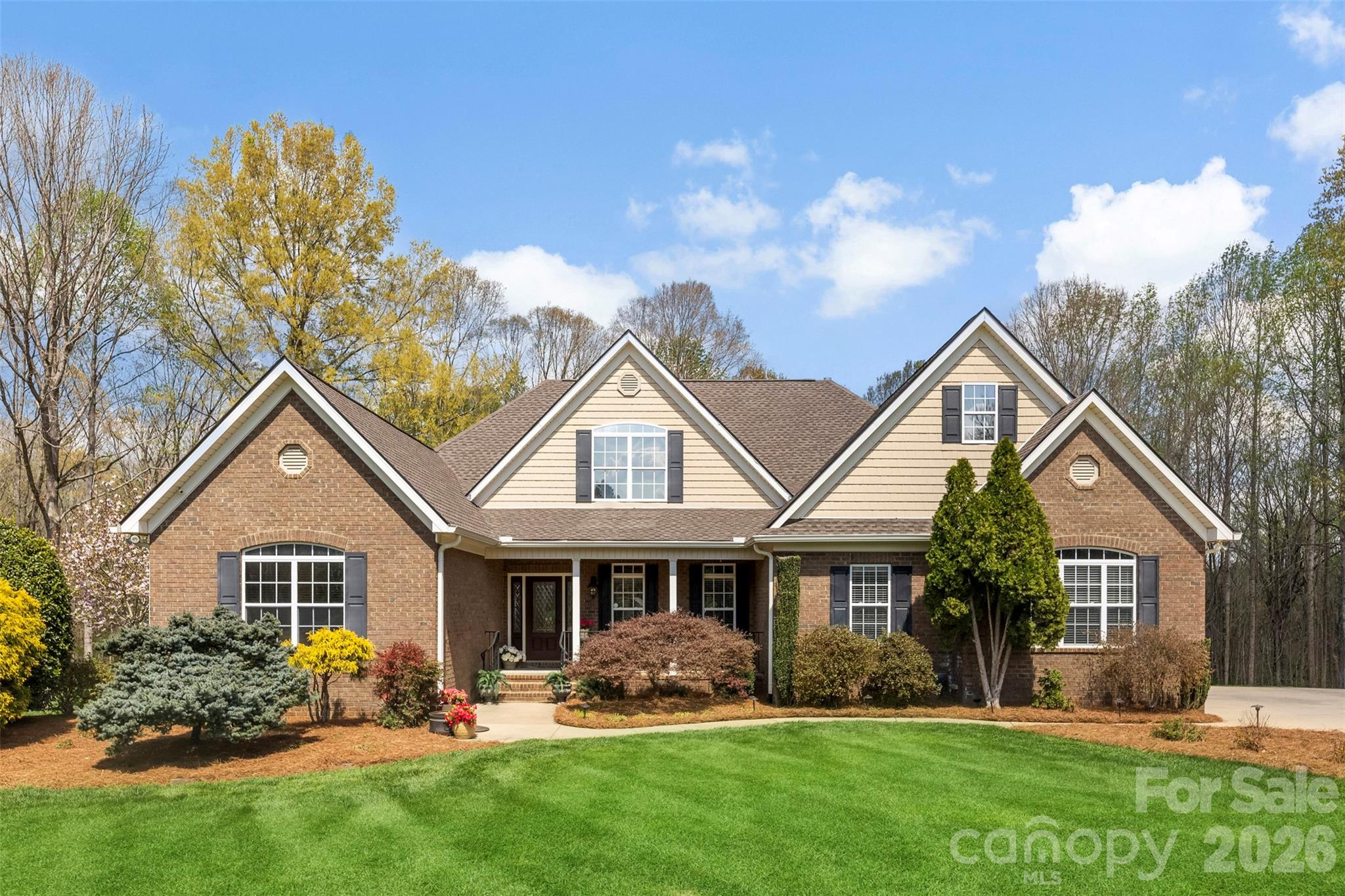 This stunning, custom-built home sits on nearly nine acres at the end of a private cul-de-sac, offering a perfect balance of privacy & convenience. The residence features 4 spacious bedrooms, 3 full baths/2 half baths and has a walk-up attic already framed and plumbed for an additional bedroom suite. This home is an entertainer's dream, w/formal dining room that flows into the Living Room, featuring soaring vaulted ceilings & stone fireplace. This area then opens to the beautifully updated gourmet Kitchen/Breakfast Area/Keeping Room.  The Kitchen is equipped with gas range, SS appliances, farmhouse sink & stunning cabinetry. The main-level primary suite serves as a private retreat with a double tray ceiling and a spa-inspired bathroom, with jetted tub, water closet and dual sinks. The Basement offers a spacious multi-purpose room, workout room, bedroom, and so much storage!  Outdoor living includes a screened porch and deck (w/gas grill hookup), overlooking the wooded view and the paver patio, landscape lighting, irrigation and patio wired for a hot tub. Additional features include a drop-zone off of the 2-car main-level garage, laundry room w/utility sink & cabinetry, tankless hot water heater and an oversized basement garage perfect for storage, lawn equipment or a hobbyist. This property has been meticulously maintained with several recent updates: HVAC systems (2020 & 2025), garage doors (2021), gutters and home generator (2022), roof (2024), Whole house re-plumbed (2025).  Peaceful & private, yet only minutes from shopping & dining, this property offers the best of country living, convenience & commutability to the city.