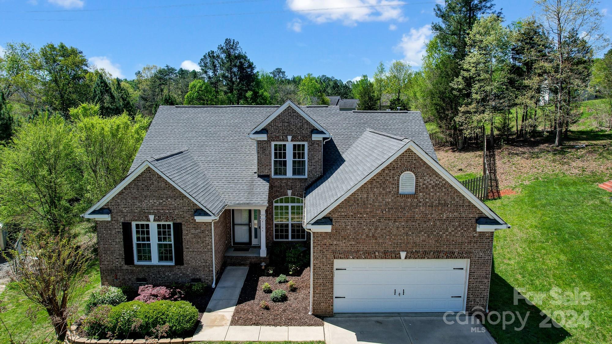 Don't miss out on this updated home situated on a spacious lot at the end of a peaceful cul-de-sac! The sellers have made this home move-in ready with numerous updates completed in 2022, such as new light fixtures, windows, vinyl siding, toilets, dishwasher, remodeled primary shower, luxury vinyl flooring on the main level, updated front & rear doors, fresh paint, a switch from brass to brushed finish on all doors & knobs. A new roof was installed in 2021. In 2020, a spacious rear deck was added, overlooking an expansive backyard enclosed by a 6-foot privacy fence, perfect for entertaining or letting pets roam freely. The community pool & playground are conveniently located on the same street. An award-winning Elementary school is conveniently located across from the neighborhood entrance, with Middle and High Schools just a short drive away. Nearby attractions include Lake Wylie's Field Day Park, Rec/Aquatic center, public boat access to Lake Wylie, while benefiting from low SC taxes.