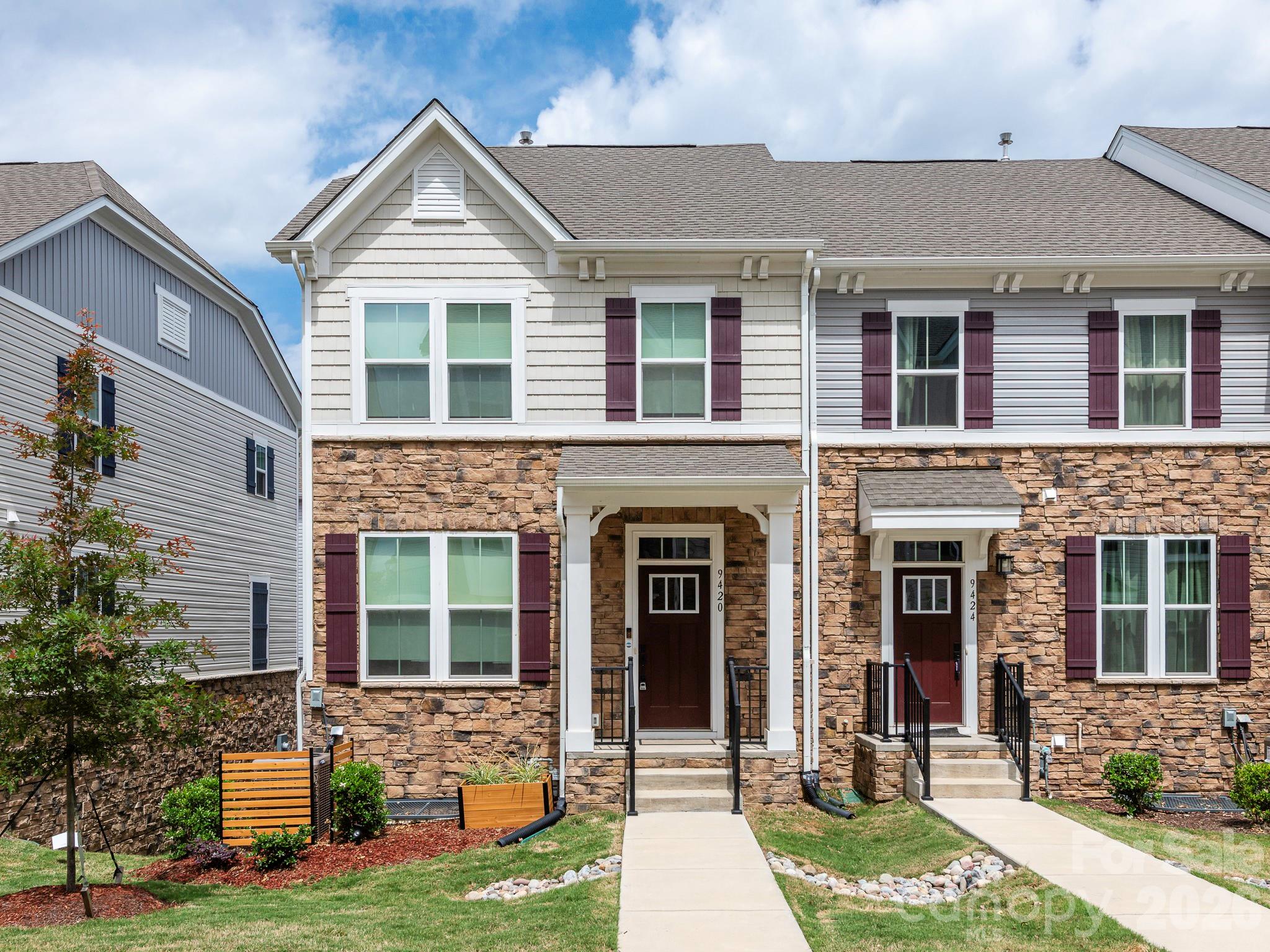 Upgraded End-Unit Townhome with Finished Basement and Garage Gym | Mallard Creek Towns, University City Charlotte 28262
Move-in ready, packed with designer upgrades, and located in the heart of University City, this three-story Mozart floor plan in Mallard Creek Towns offers end-unit privacy, a finished walk-out basement, and a fully usable garage gym setup. It is one of the most complete townhomes available in 28262.
Main Level
The open-concept kitchen and living area features luxury vinyl plank flooring, a gas range, stainless steel appliance package, and a center island with upgraded pendant lighting. Under-cabinet lighting, a single-bowl sink with upgraded faucet, custom blinds, and a black overhead ceiling fan in the living room round out the space. Step out to the private cantilevered deck for morning coffee or evening grilling. A fully upgraded powder room (paint, sink, mirror, and lighting) and direct entry from the rear-load two-car garage complete the main level.
Garage: Built-In Home Gym
The two-car garage doubles as a private home gym, giving you a dedicated space to train without leaving home or paying for a membership. A standout feature for buyers who want function and flexibility.
Upper Level
The primary suite is a true retreat with a tray ceiling, walk-in closet, and a fully upgraded ensuite. The custom shower features matte black fixtures, a black-framed glass door, and designer shower head and handles. Dual sinks include black faucets, hardware, and towel racks, paired with electronic LED mirrors. Two guest bedrooms feature custom blinds and black overhead ceiling fans, with a designer barn door in one. A second full bath and upstairs laundry room with sliding doors, custom shelving, and an LG stackable washer and dryer round out the floor. Nine-foot ceilings throughout.
Lower Level
The finished walk-out basement includes sound acoustic wall treatments, a spacious recreation room, and a powder room. Ideal as a home office, media room, or guest space. A pulldown attic ladder offers bonus storage.
Smart and Efficient
WiFi smart thermostat, WiFi garage door opener, smart locks, Ring doorbell, tankless natural gas water heater, LED lighting throughout, and TV pre-wire with 4K HDMI and ethernet. Custom paint and accent walls add character without the work.
Prime University City Location
Minutes from UNC Charlotte, University Research Park, Atrium Health University City, I-485, I-85, Concord Mills, and the LYNX Blue Line. One of Charlotte's most convenient addresses for commuters, healthcare professionals, and anyone working in the University City or Concord corridors.
If you have been searching for an upgraded end-unit townhome in University City Charlotte with a finished basement and a built-in garage gym, this Mallard Creek Towns home checks every box. Schedule your private showing today.