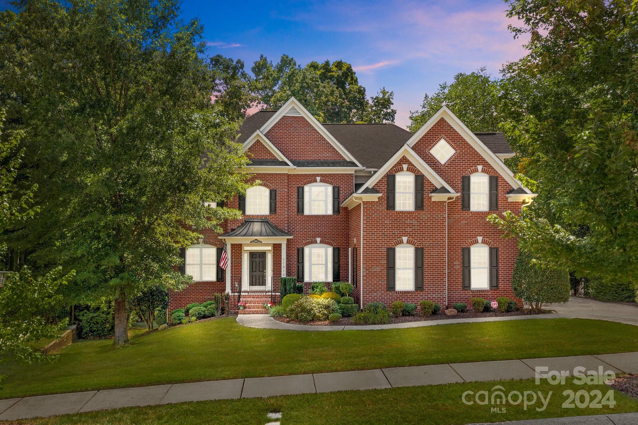 Welcome to 11310 Canoe Cove Lane. Located in the popular Latta Springs offering an idyllic setting with tree lined streets, community pool, playground & covered cabana. The stately brick front sets a grand tone and once inside immediately greeted by a two-story foyer flanked by an office & dining room. Main level features an effortless flow to intimate settings perfect for everyday occasions. Kitchen opens to the breakfast area and family room which guarantees a space for all to congregate. Generous primary suite with oversized ensuite with a tile shower, garden tub, walk in closet. Additional walk-in closet located in hallway. Three additional bedrooms, two full baths, and fourth bedroom/bonus to complete the second level. A finished basement level offers an additional recreation space, bar/entertainment, billiard area as well as a sixth bedroom with a full bathroom. Beautiful rear yard, adorned with trees ensuring privacy, also features a separate area with a play set.